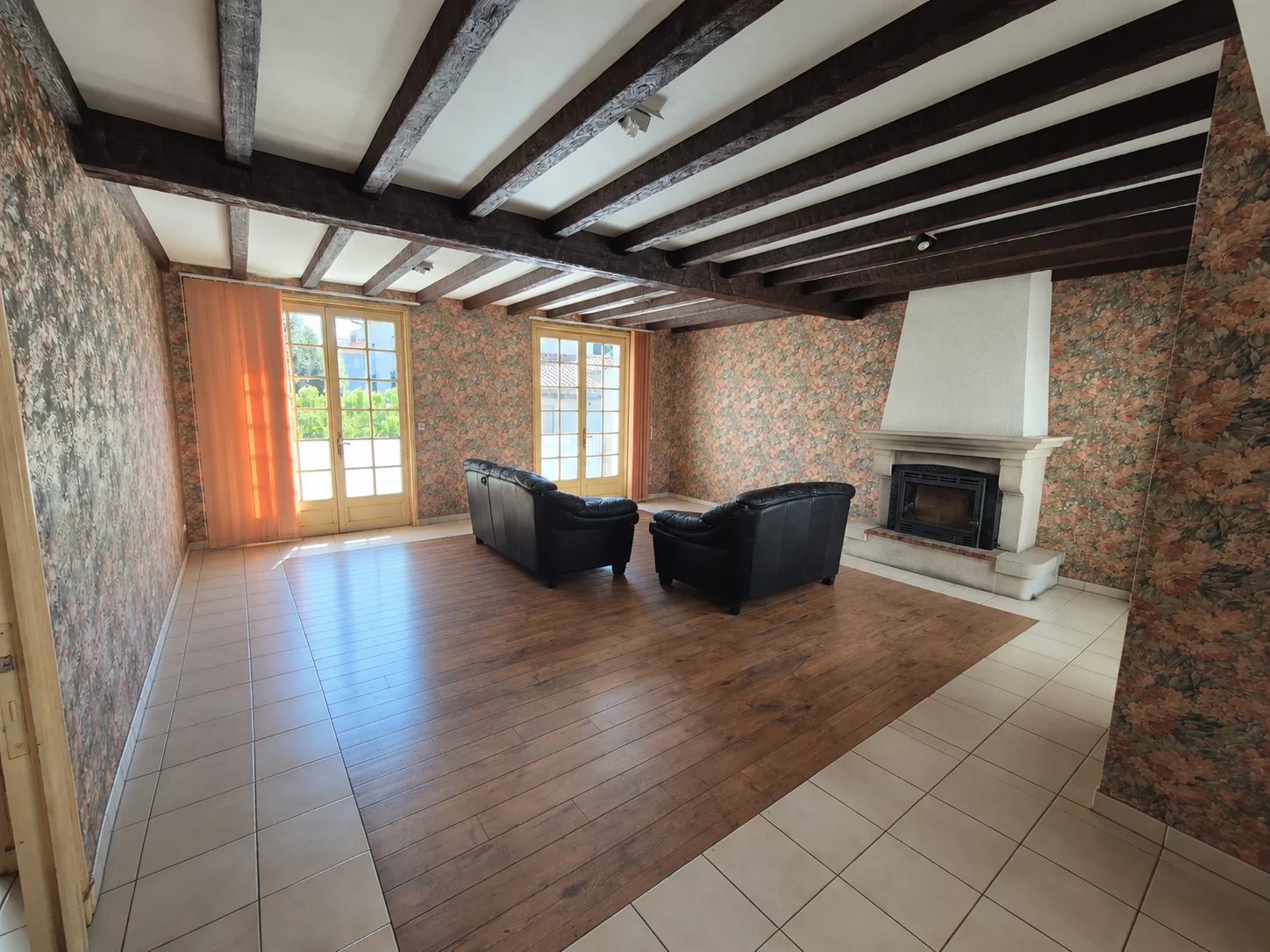 Maison de ville sur 2 niveaux avec terrain