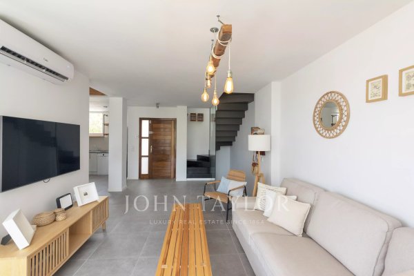 Exclusive townhouse in Cala Vadella with spectacular sea views, set within a private and exclusive development of just four homes with a communal swimming pool. — photo 1