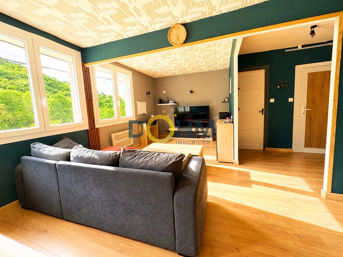 Appartement F4 avec garage, cave et terrain