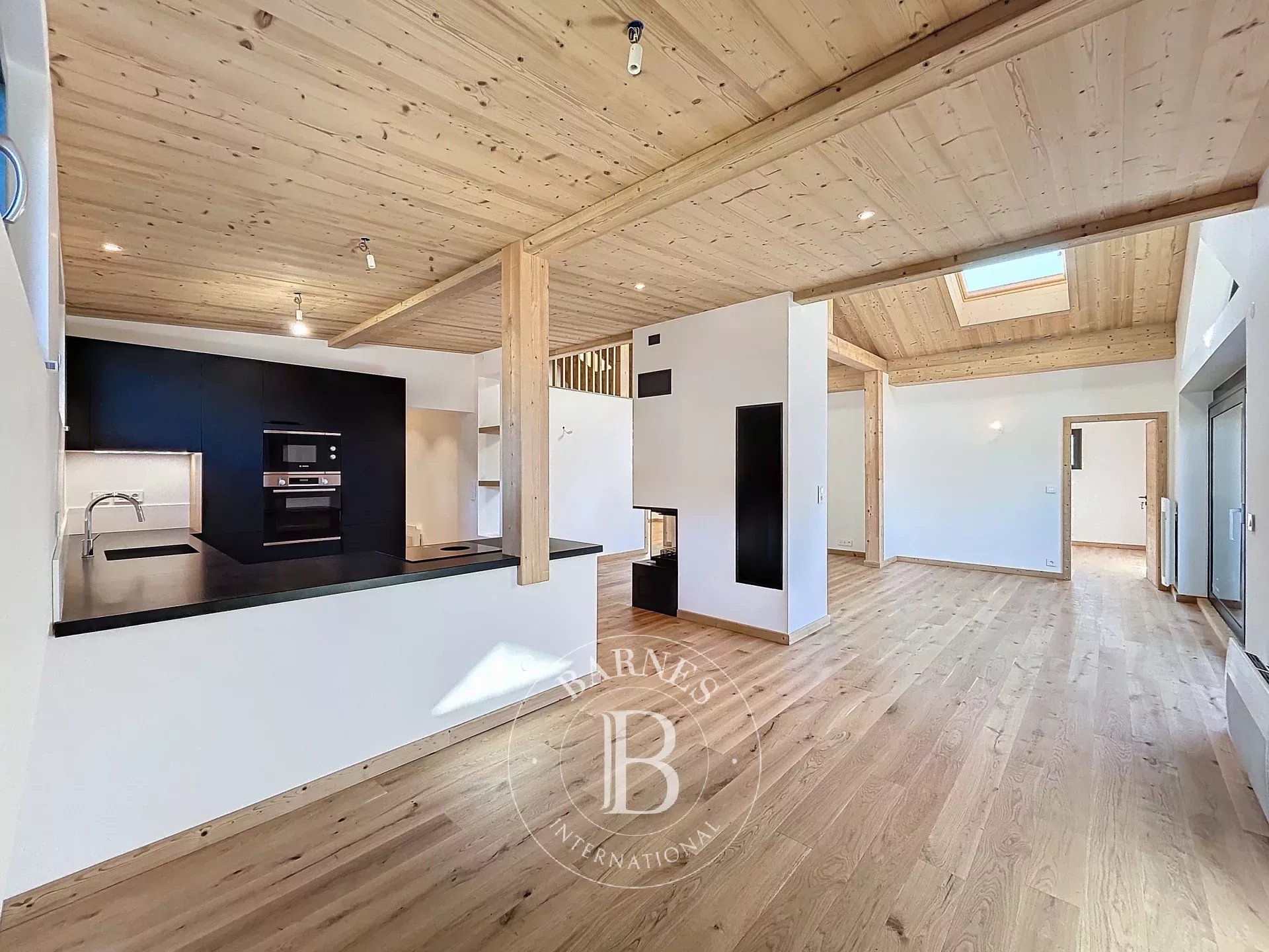 Photo of Châtel - T4 apartment (2023) of approximately 107,22 sq m of living space - 3 bedrooms - Village heart - Panoramic view - Fireplace - 2 covered parking spaces