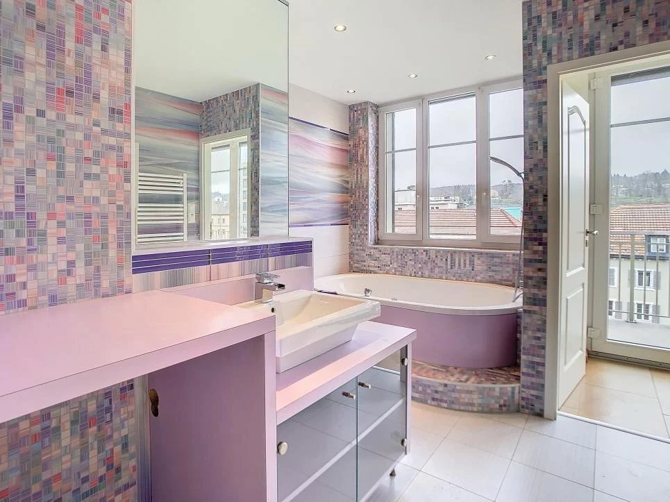 Duplex en attique avec terrasse au centre-ville