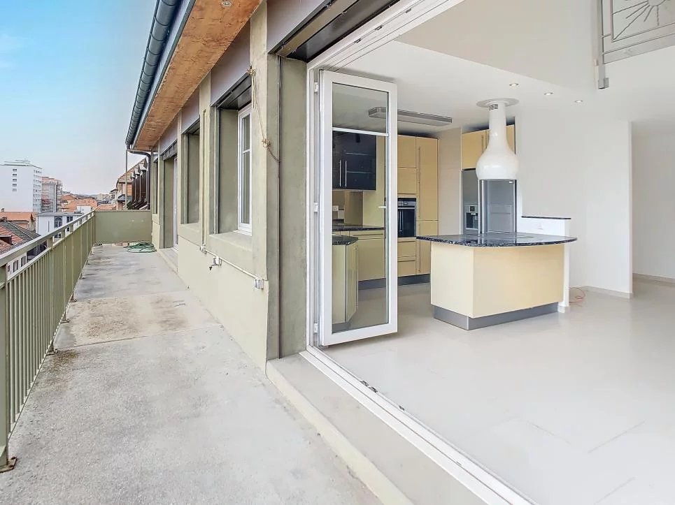 Duplex en attique avec terrasse au centre-ville
