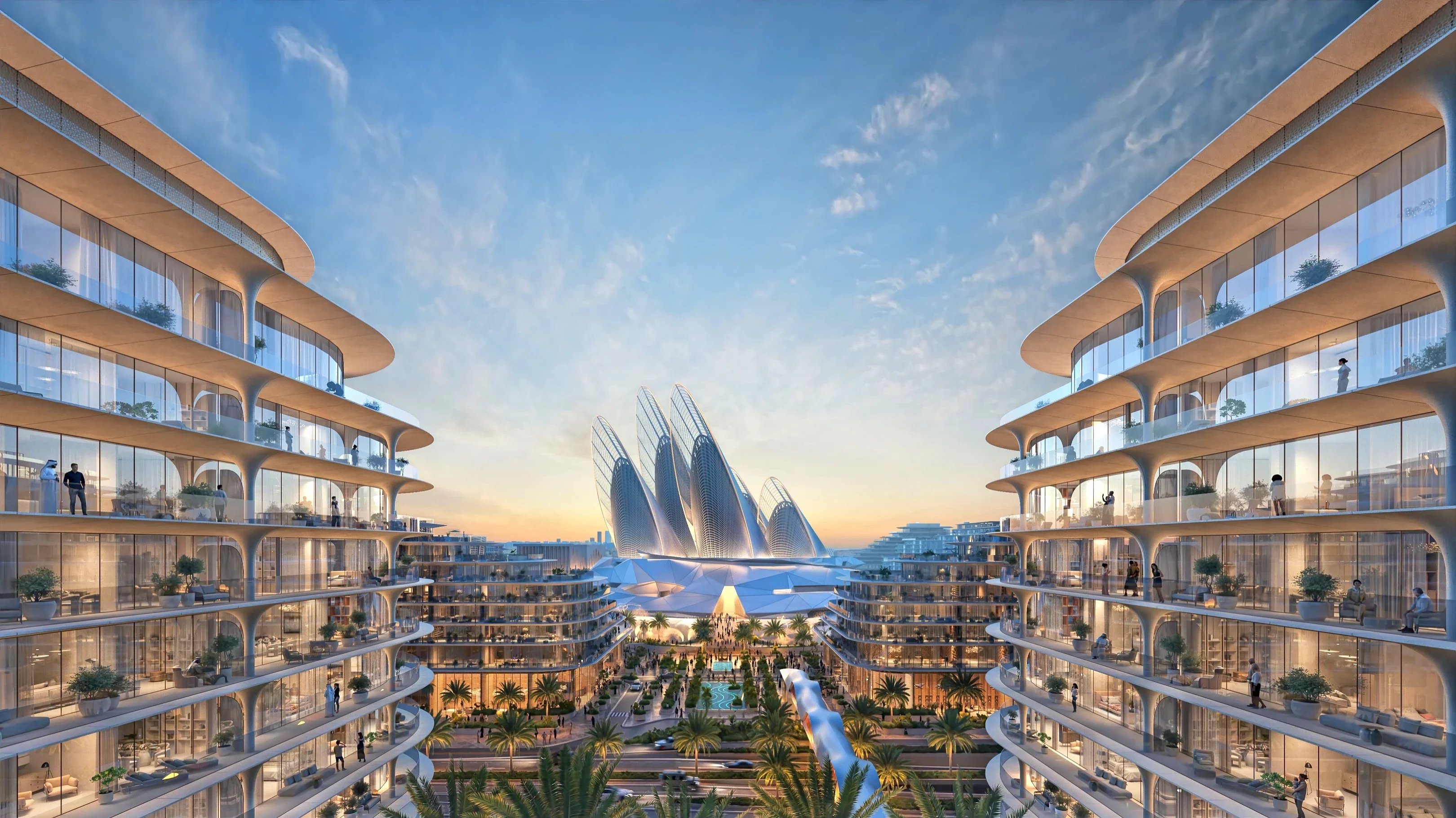 Ein modernes architektonisches Ensemble mit zwei geschwungenen Gebäuden, dazwischen eine palmen-gesäumte Allee und im Hintergrund futuristische Strukturen, unter einem blauen Himmel.