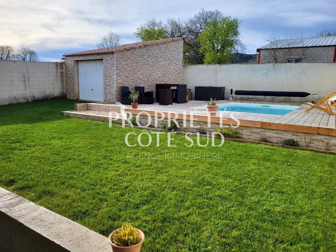 Maison de plain-pied 93 m2 sur terrain 512 m2 avec piscine et garage