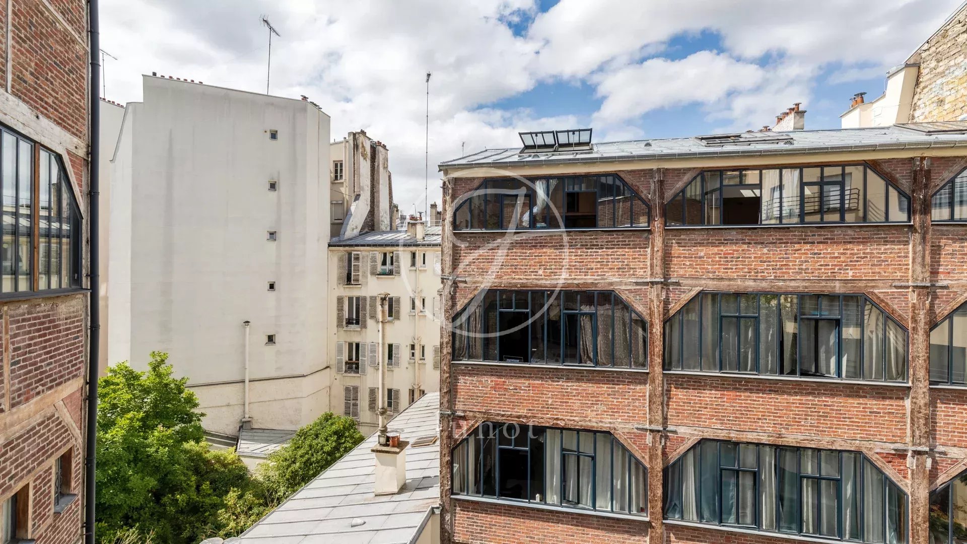 Paris 18e - LAMARCK / CAULAINCOURT - Appartement à vendre style loft - 4 pièces - 122,70m² Carrez - 2 à 3 chambres.