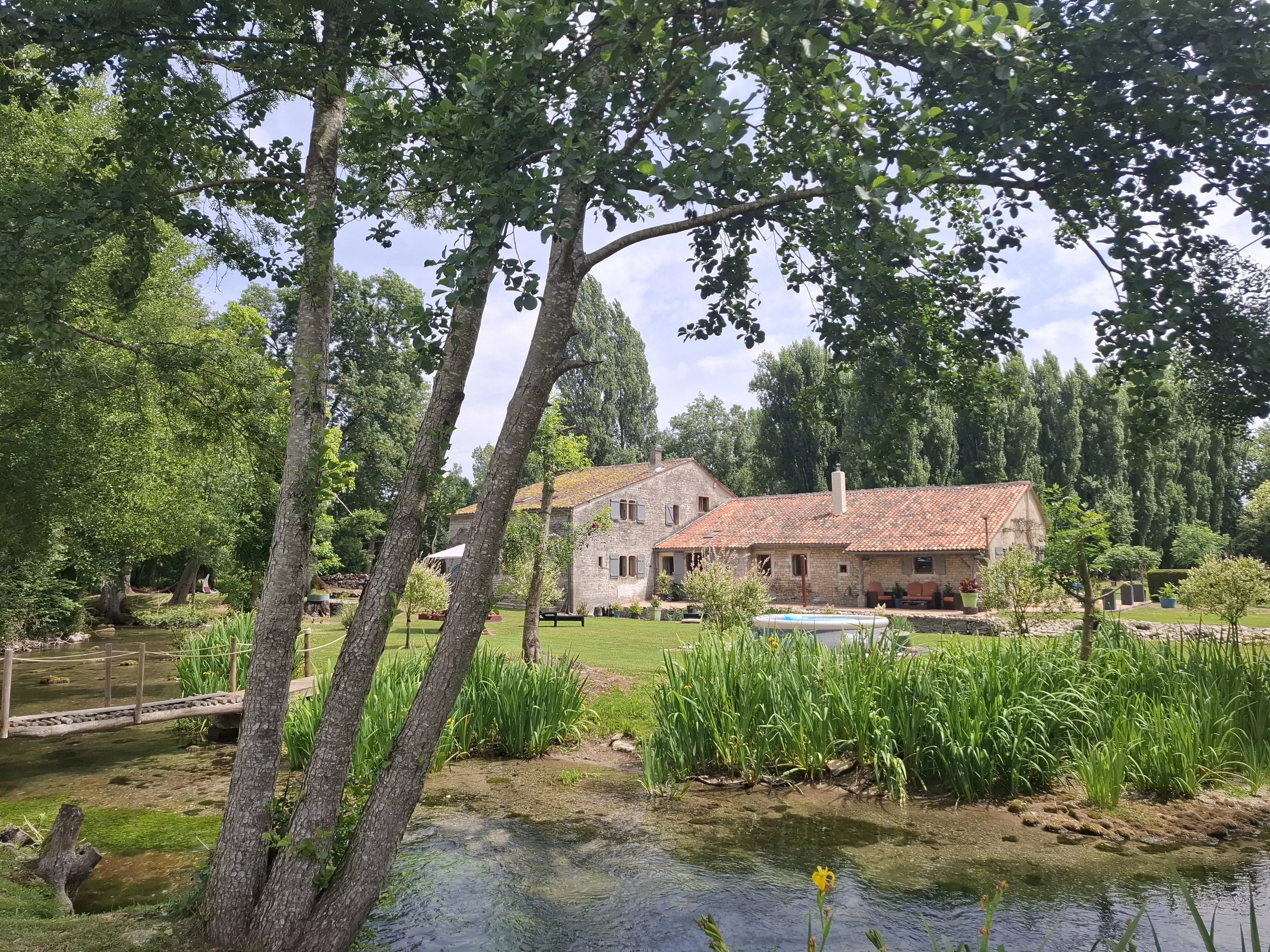 Perfectly presented riverside guest house, with character mill, in stunning location close to town