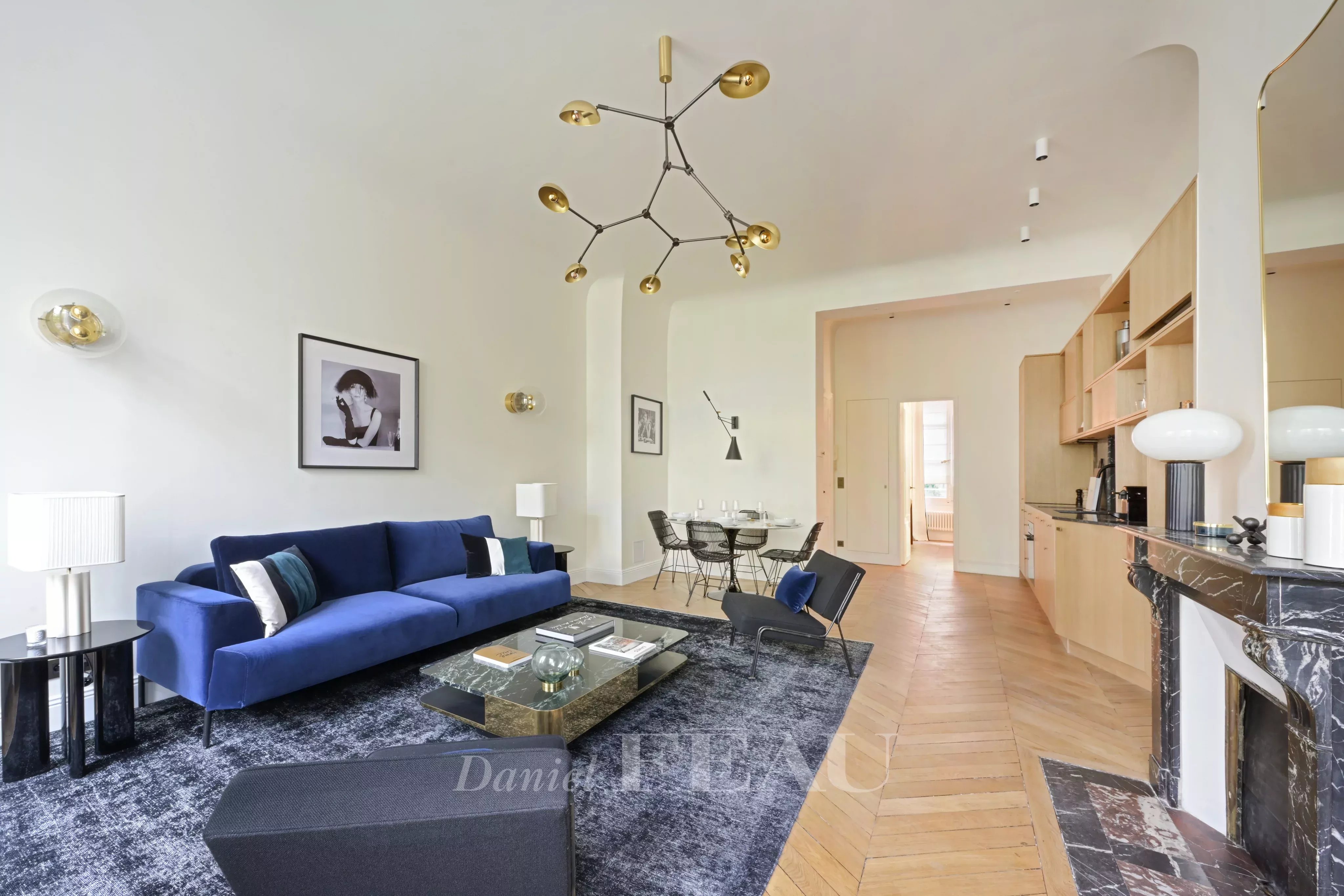 Living room with open kitchen, fireplace