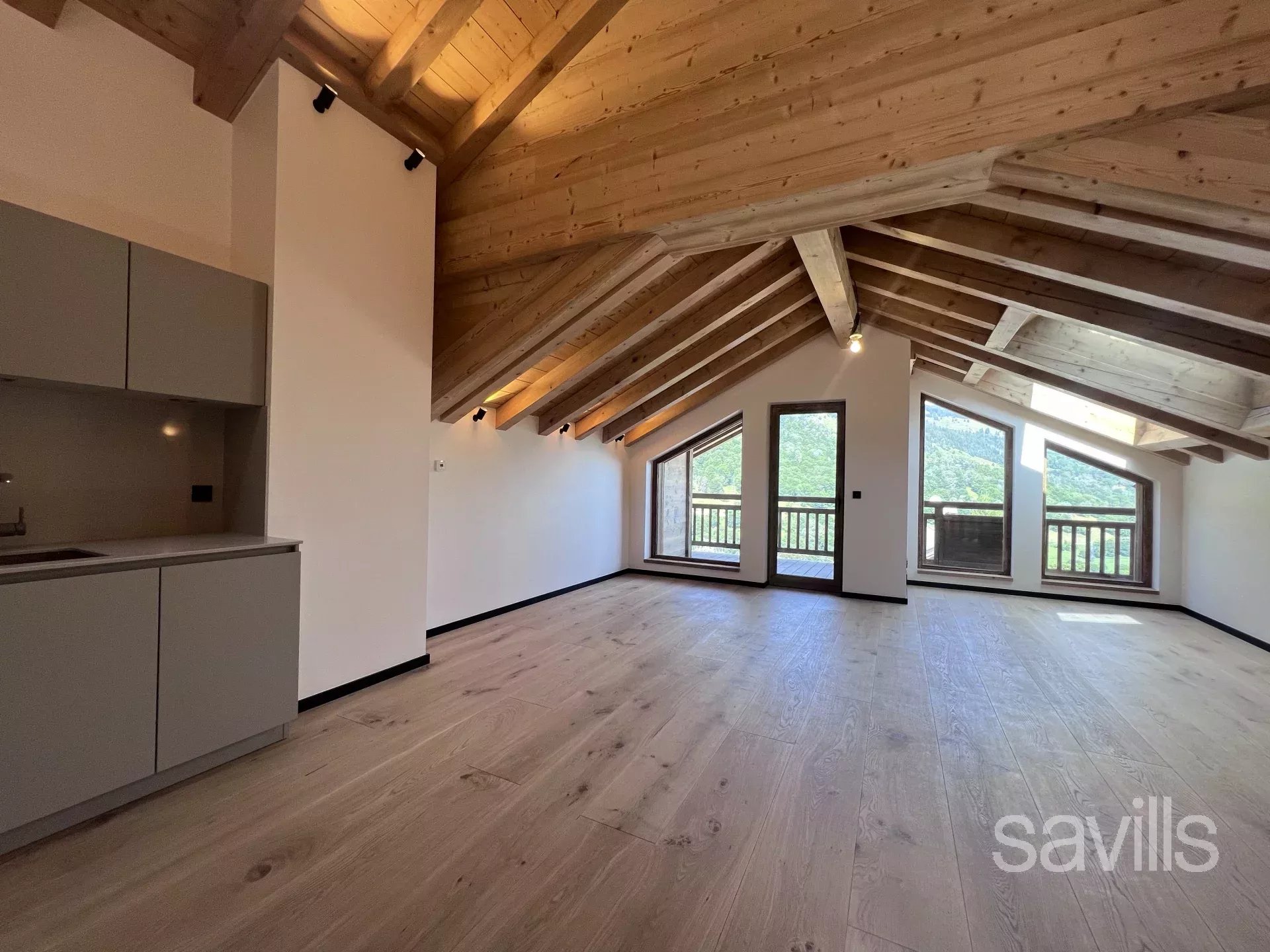 New build, five bedroom chalet in an authentic village, complete with garage and spa.