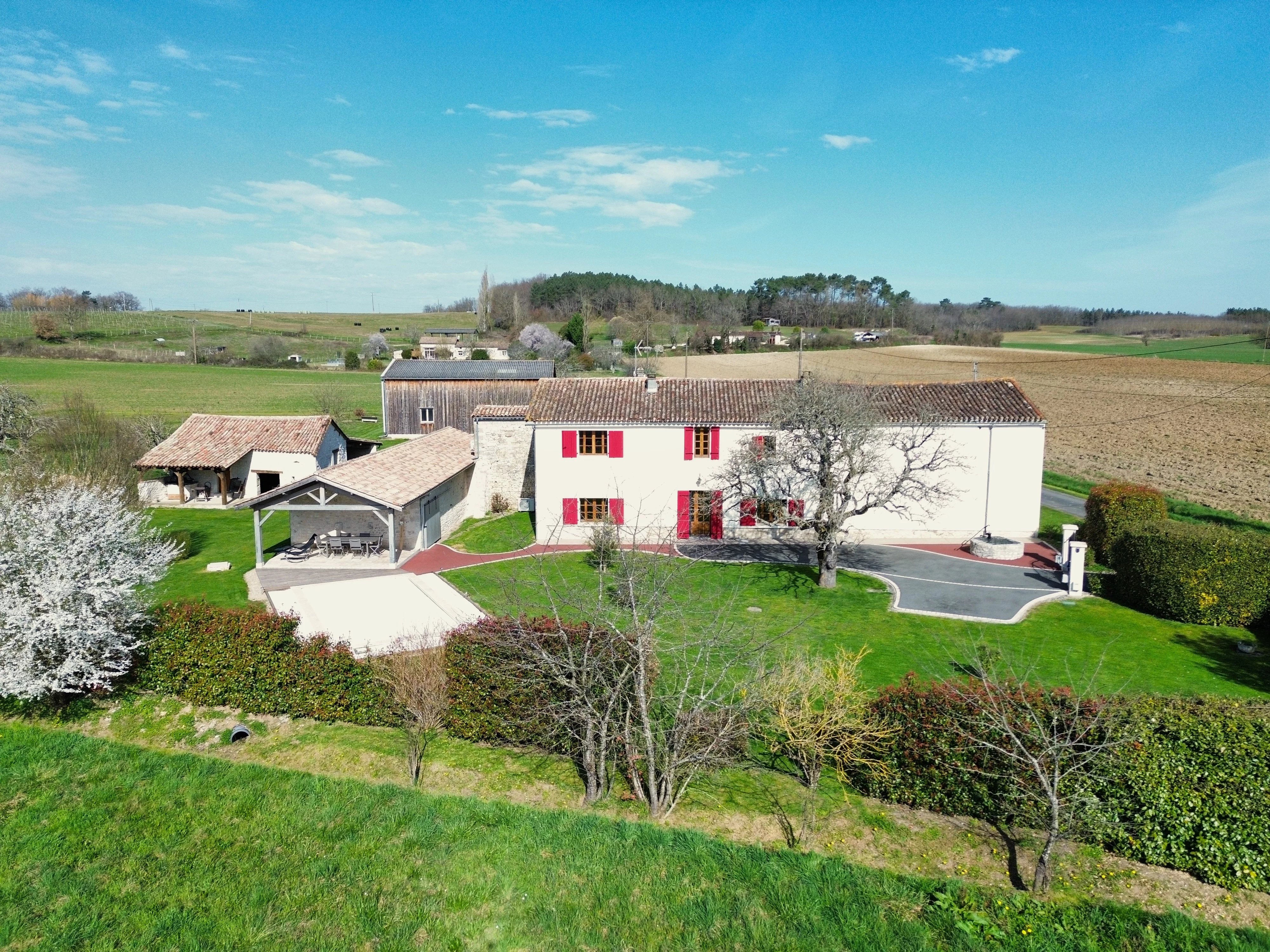 Attractive renovated stone farmhouse, outbuildings and a 280m2 building