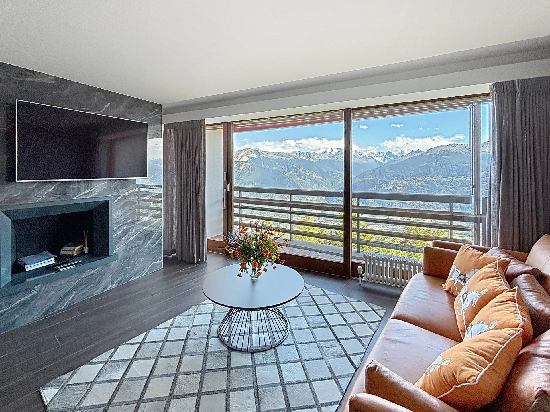Deux magnifiques appartements de standing reliés avec une avec une vue panoramique sur les Alpes
