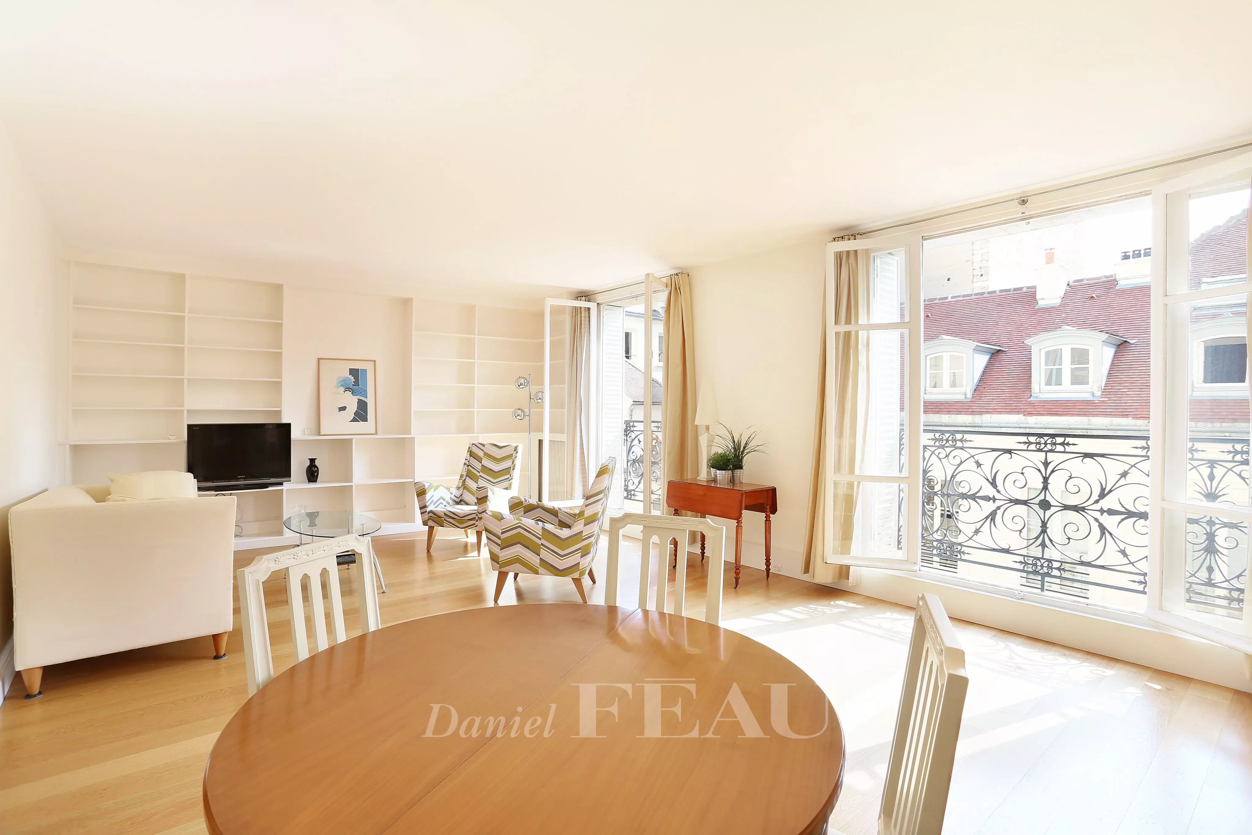 Dining room Fireplace Natural light Carpet Wooden floor