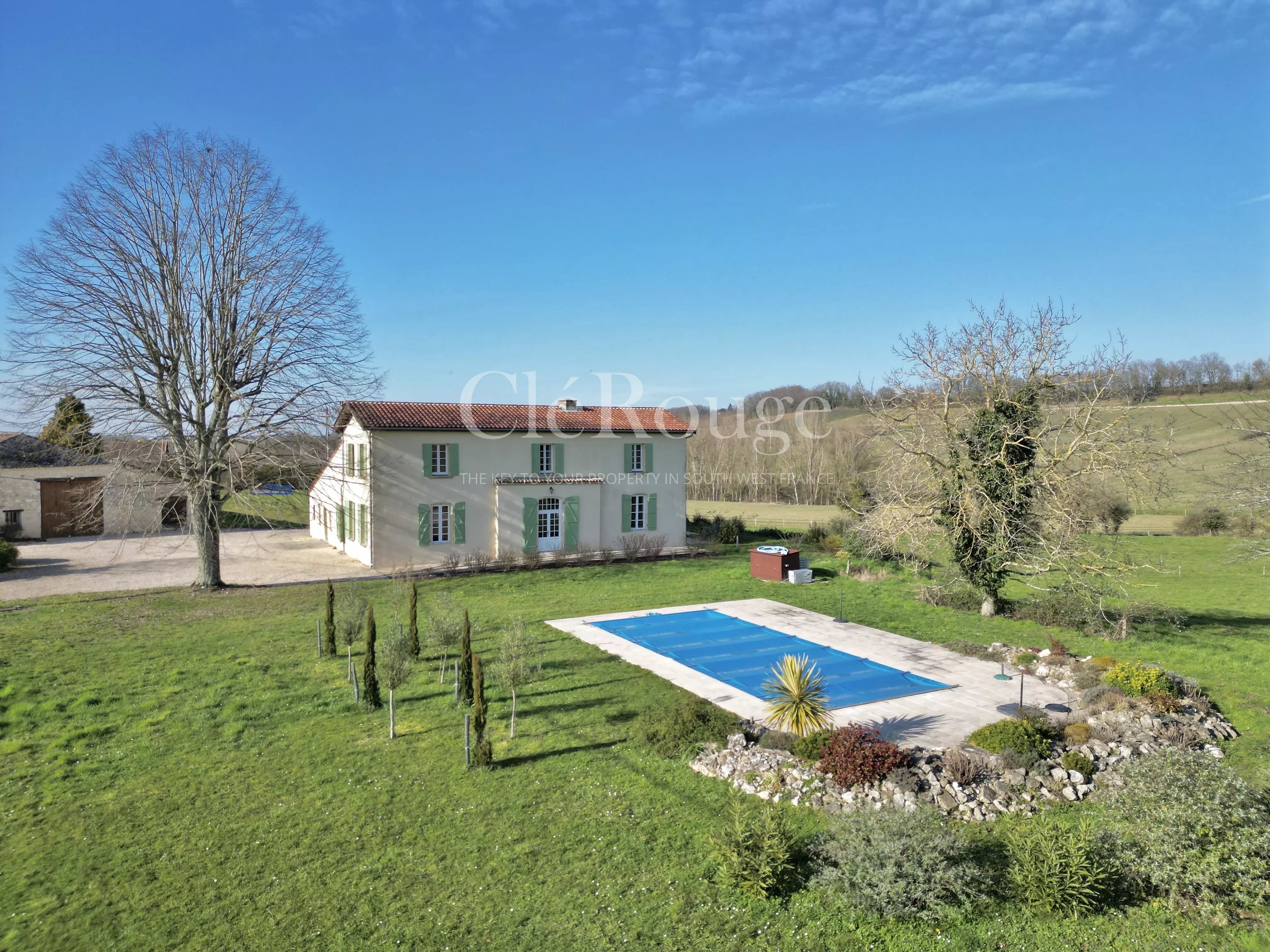 Elégante propriété en pierre avec 2 gîtes, piscine et grange située dans le triangle d'or entre Duras et Eymet