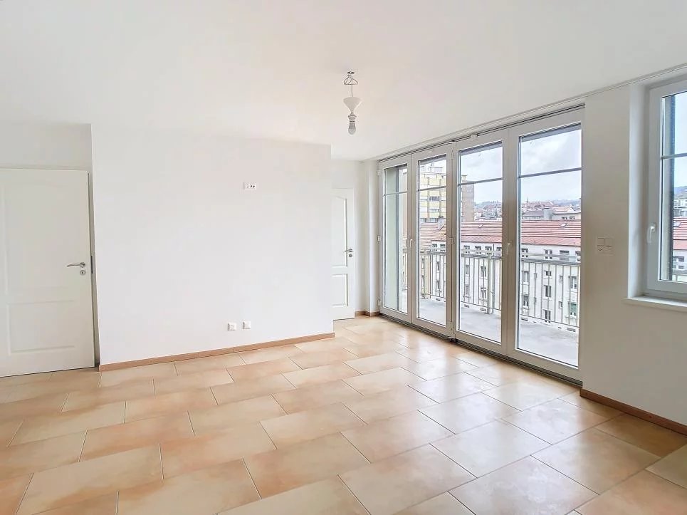 Duplex en attique avec terrasse au centre-ville