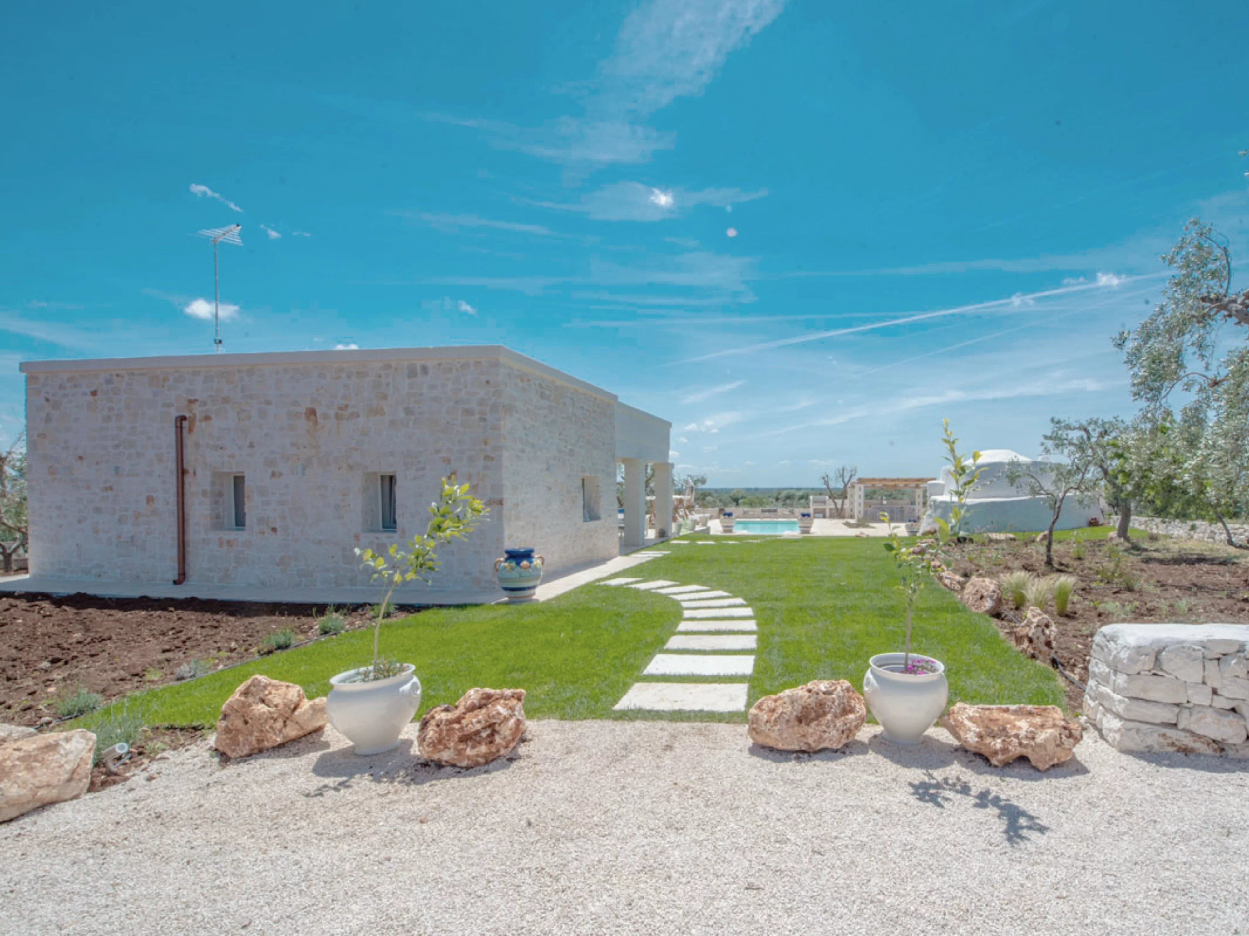 HISTORIC TRULLO AND CONTEMPORARY VILLA WITH SWIMMING POOL NEAR OSTUNI