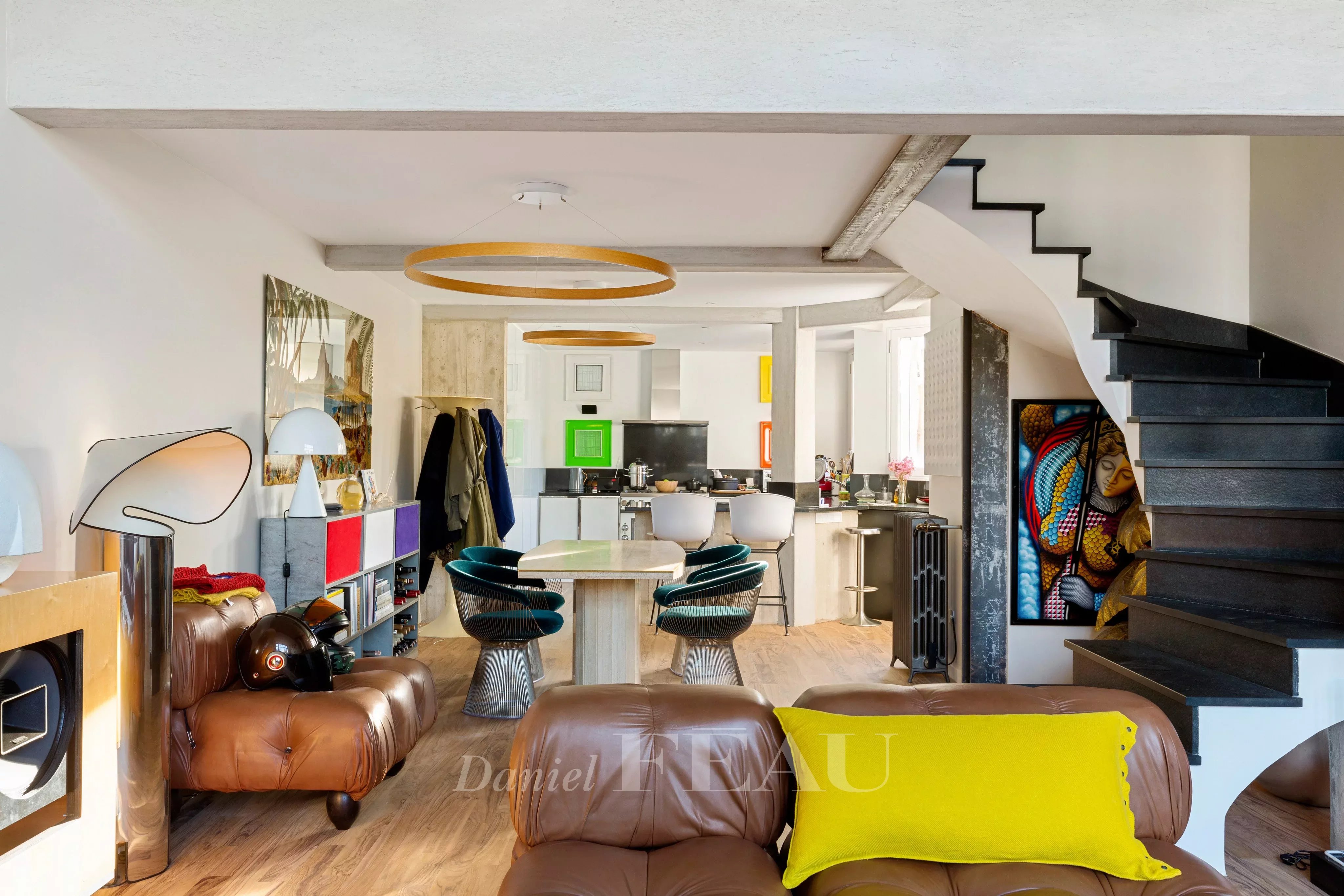 Living room with open kitchen and dining room