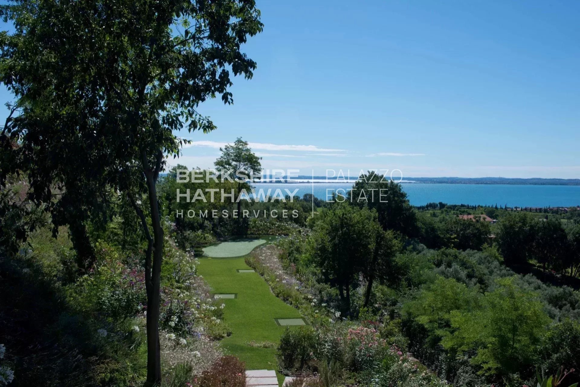 Modern Apartment with Private Garden and Exclusive Amenities on Lake Garda