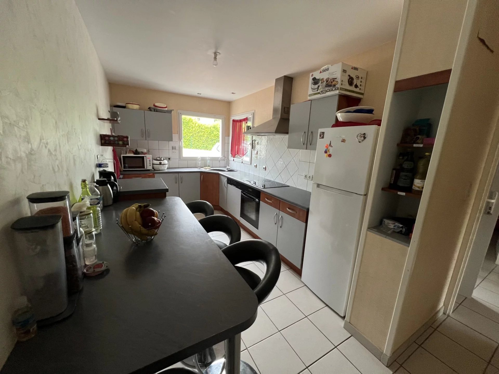 Maison proche centre-ville avec garage, 4 chambres, jardin, terr