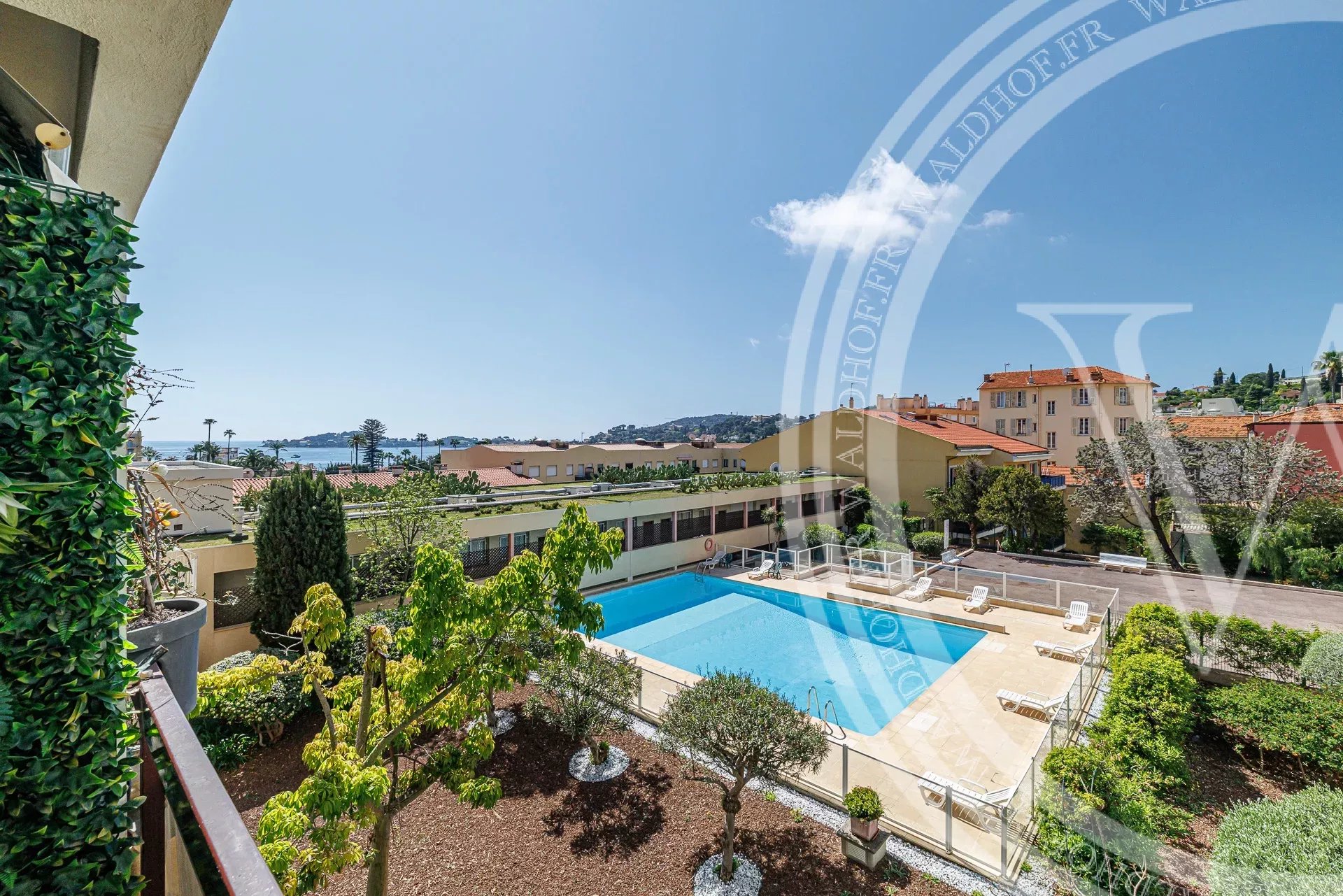 Appartamento con Giardino e Piscina Condominiale