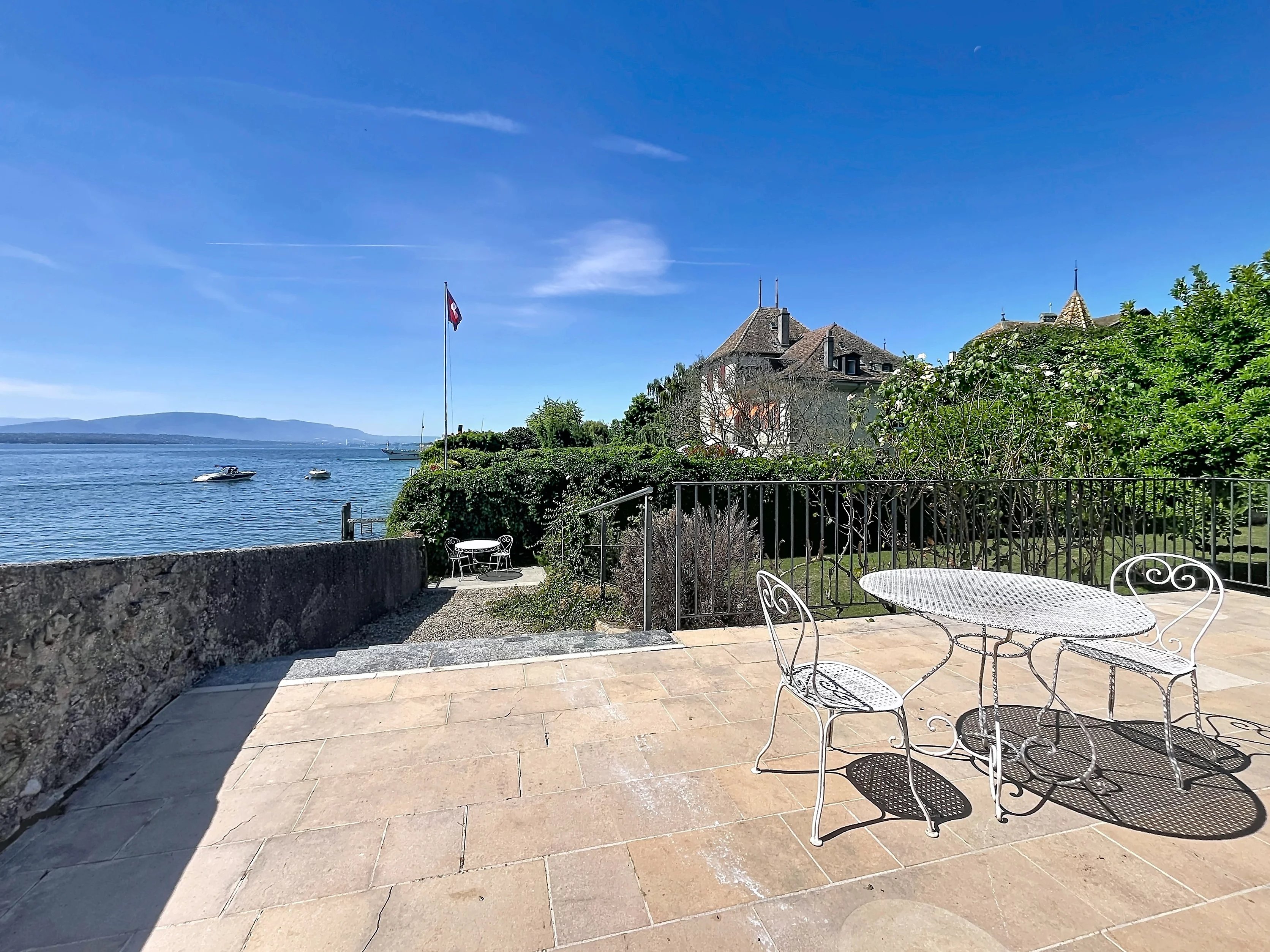 Exceptional Waterfront Property with Private Dock and Panoramic Lake Views