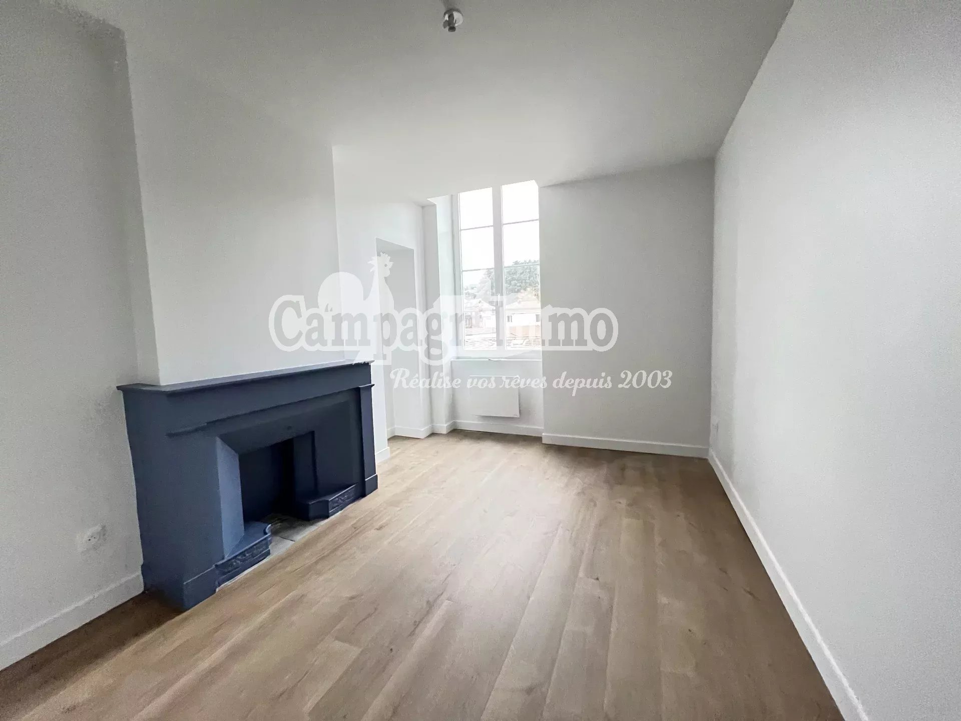 T2 - 2EME ETAGE - CENTRE VILLE - Photo 2