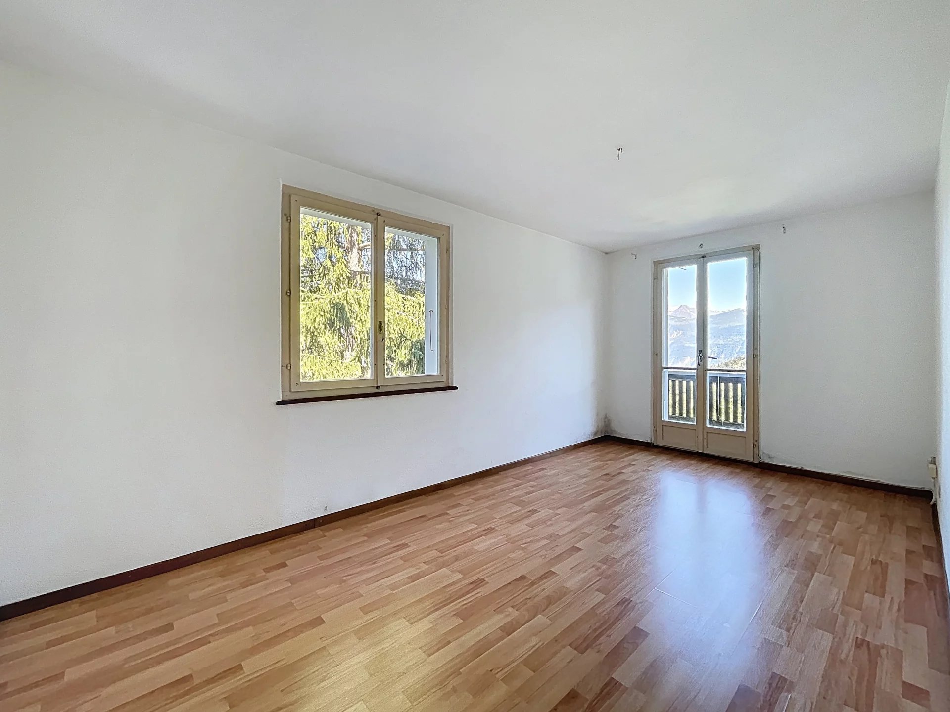 Maison dans un écrin de verdure