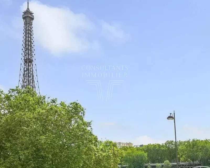 APPARTEMENT TRAVERSANT VUE TOUR EIFFEL ET SEINE