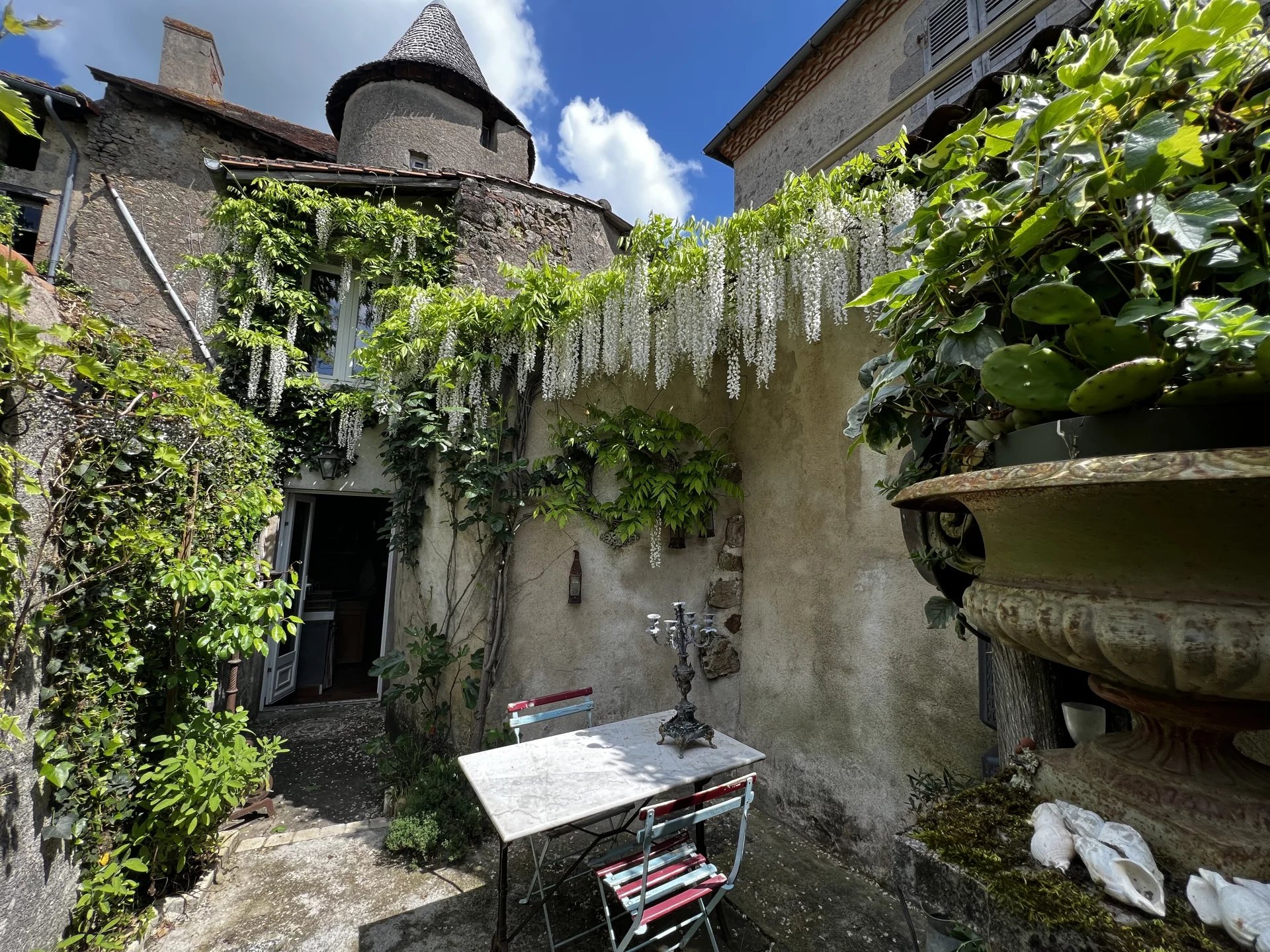 Charming historic 15 century home with tower and stone staircase in beautiful medieval town