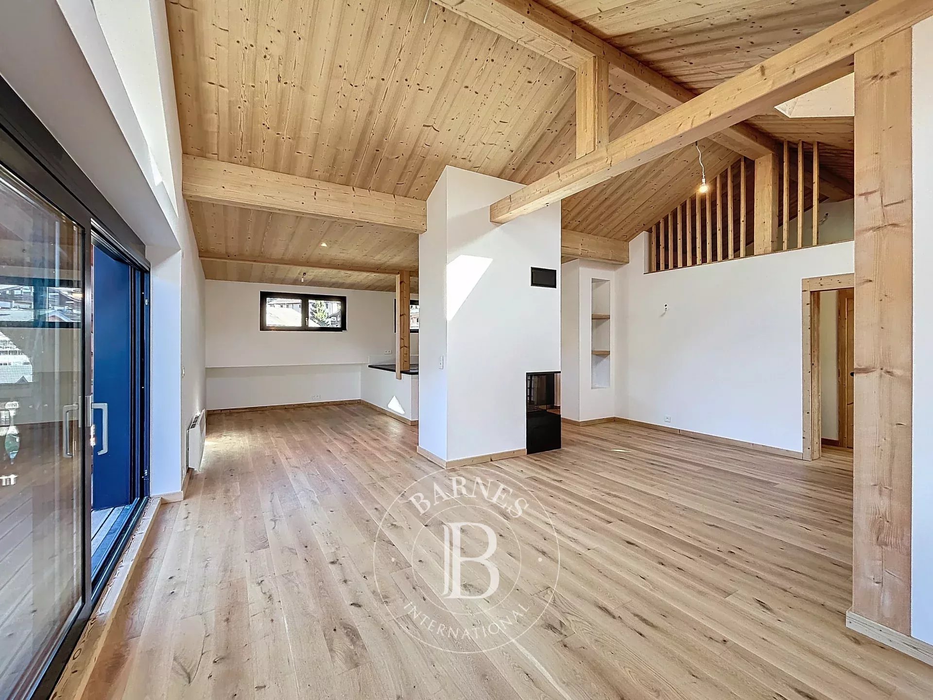 Photo of Châtel - T4 apartment (2023) of approximately 107,22 sq m of living space - 3 bedrooms - Village heart - Panoramic view - Fireplace - 2 covered parking spaces