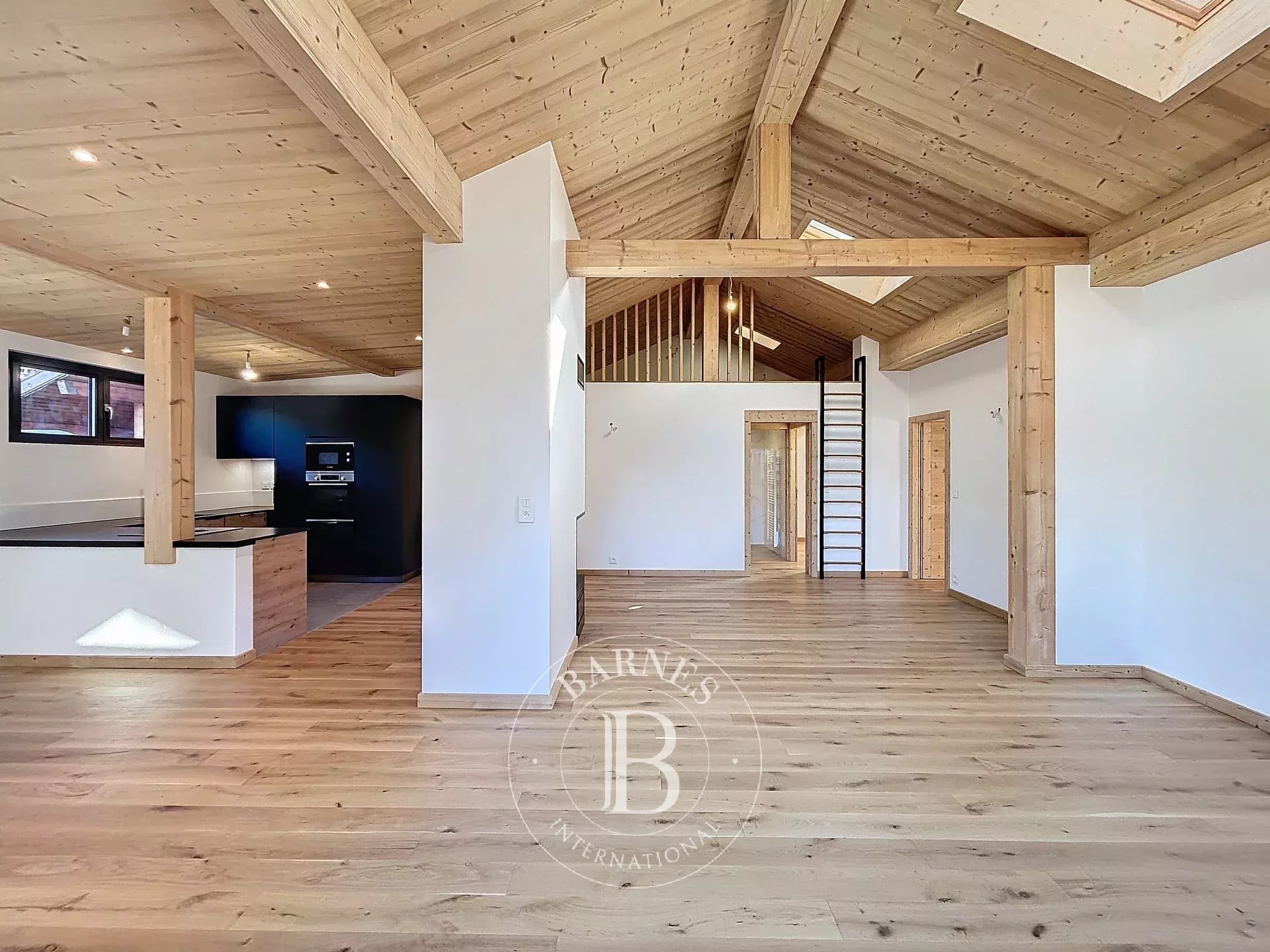 Photo of Châtel - T4 apartment (2023) of approximately 107,22 sq m of living space - 3 bedrooms - Village heart - Panoramic view - Fireplace - 2 covered parking spaces