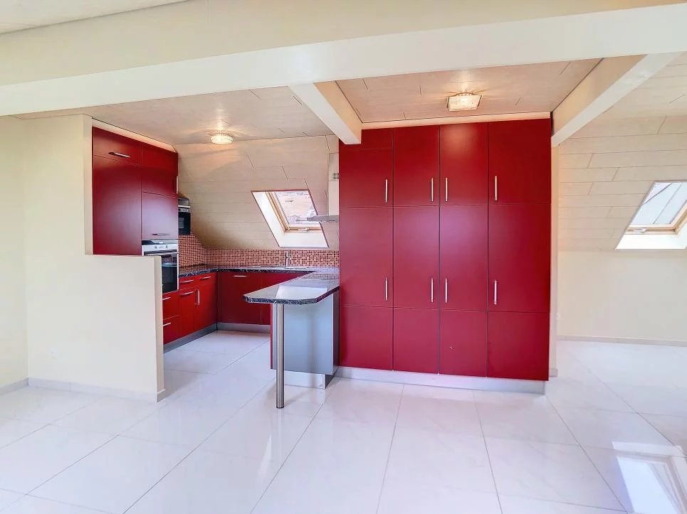 Duplex en attique avec terrasse au centre-ville