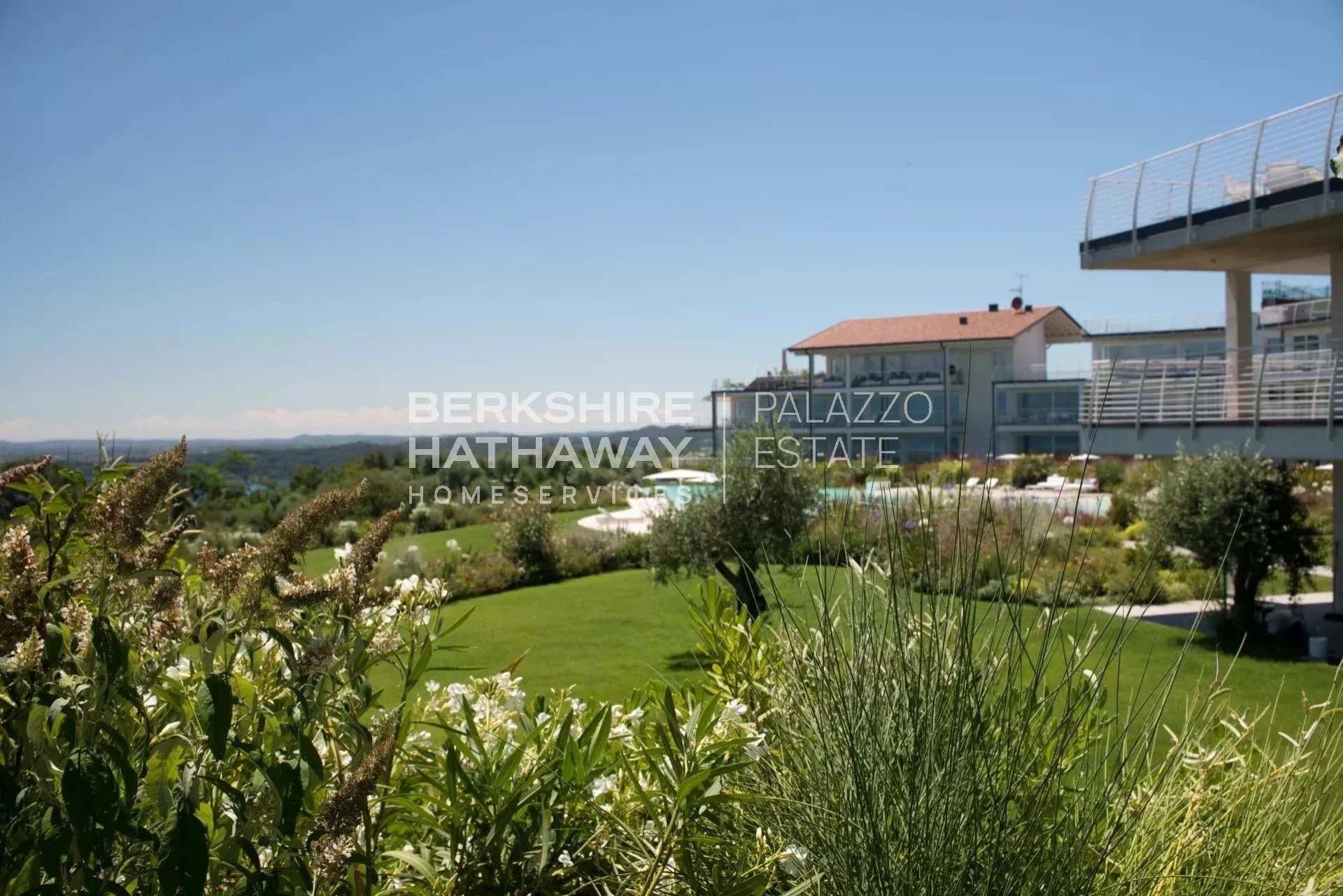 Modern Apartment with Private Garden and Exclusive Amenities on Lake Garda