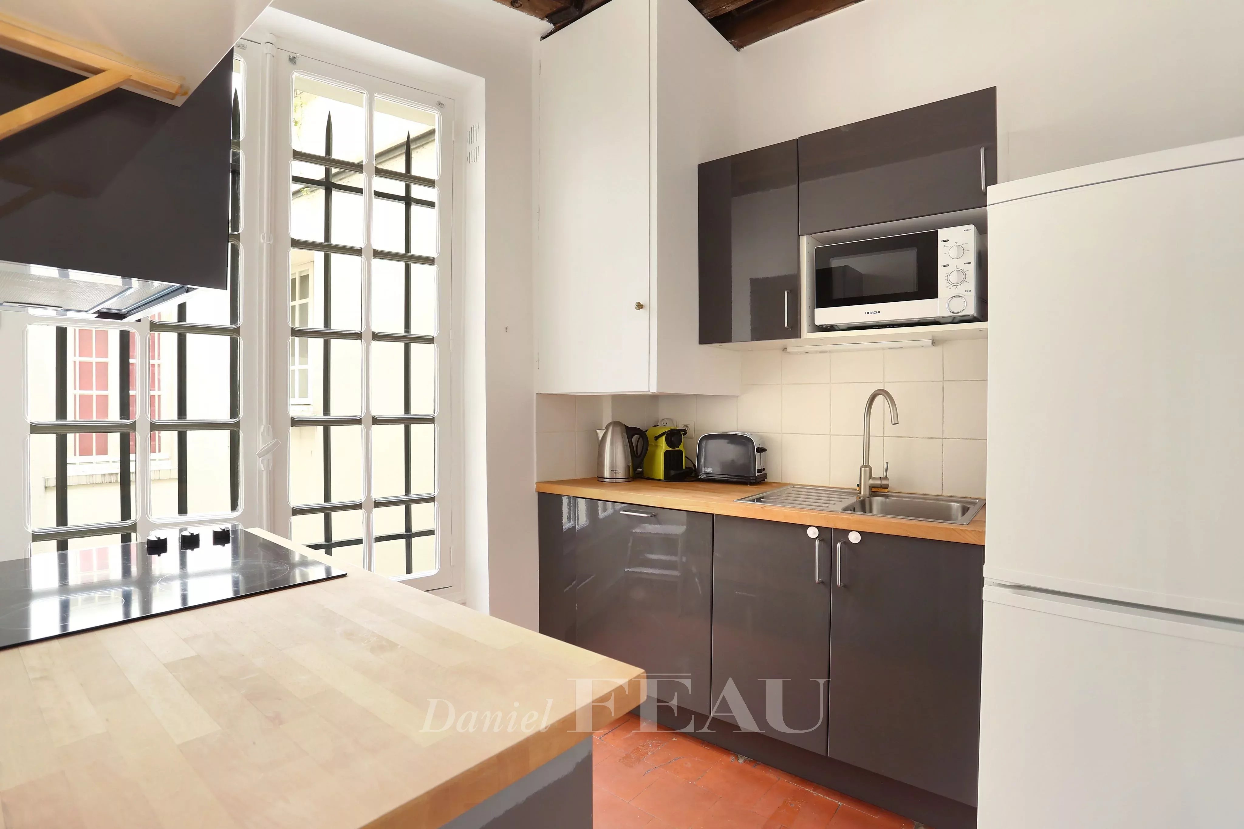 Kitchen Stainless steel Sliding windows Wooden floor