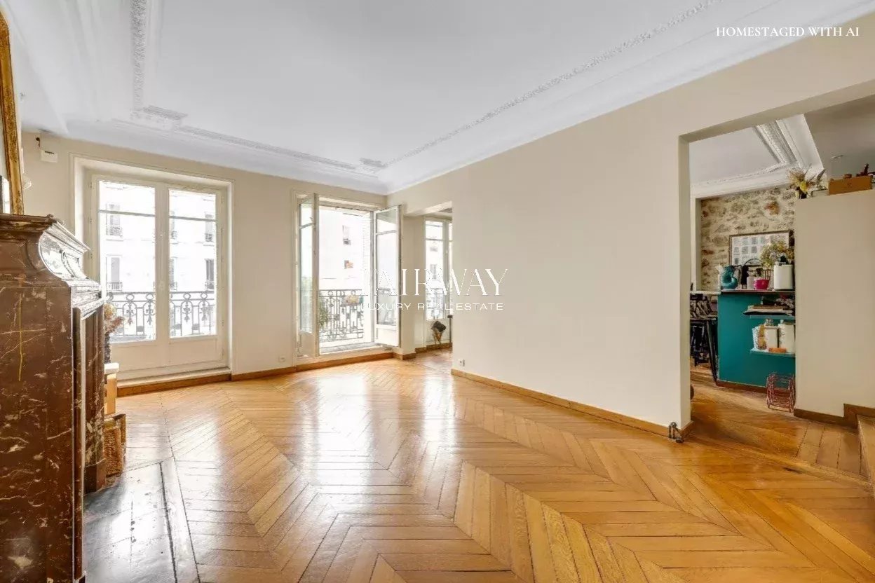 Appartement familial traversant de 114m² avec balcon et 3 chambres au cœur des Batignolles – Paris 17ᵉ