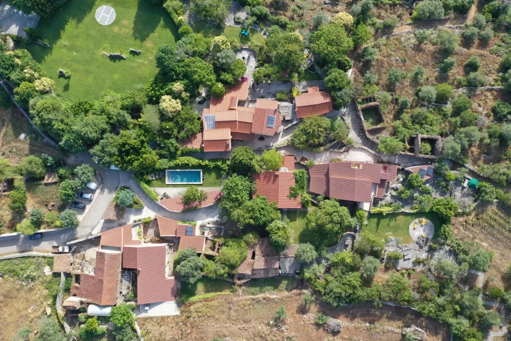 Own 14 houses in your private Portuguese village