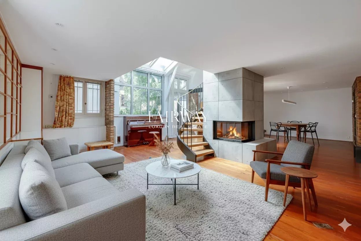 Maison d'artiste de 141m² avec jardin partagé à la lisière du 9e arrondissement de Paris