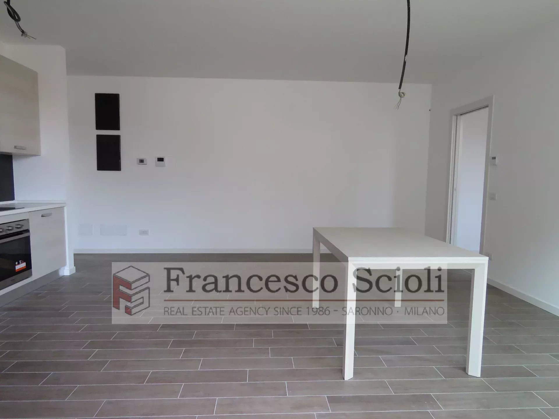 Soggiorno con cucina a vista