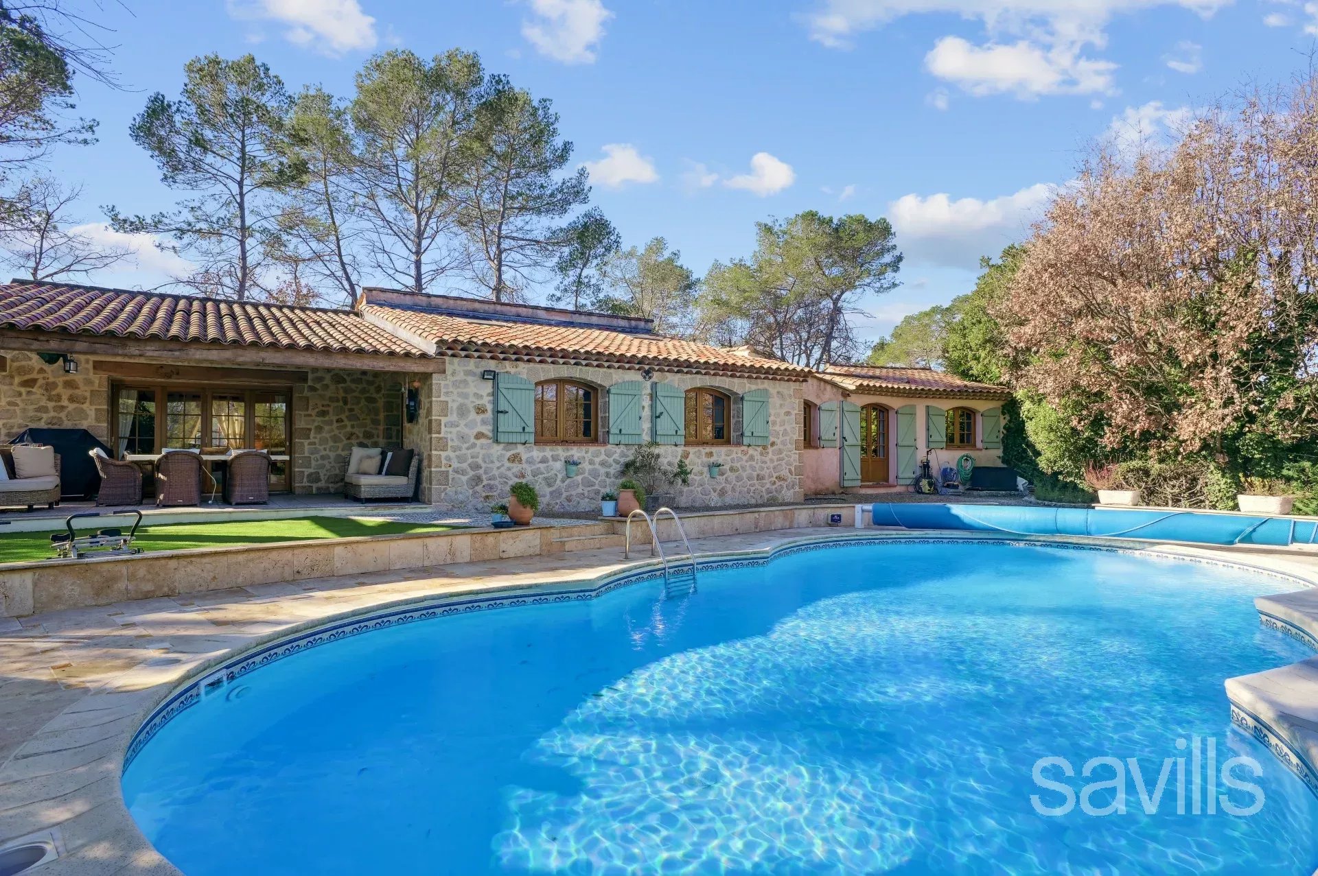 Charming single-story villa with pool.