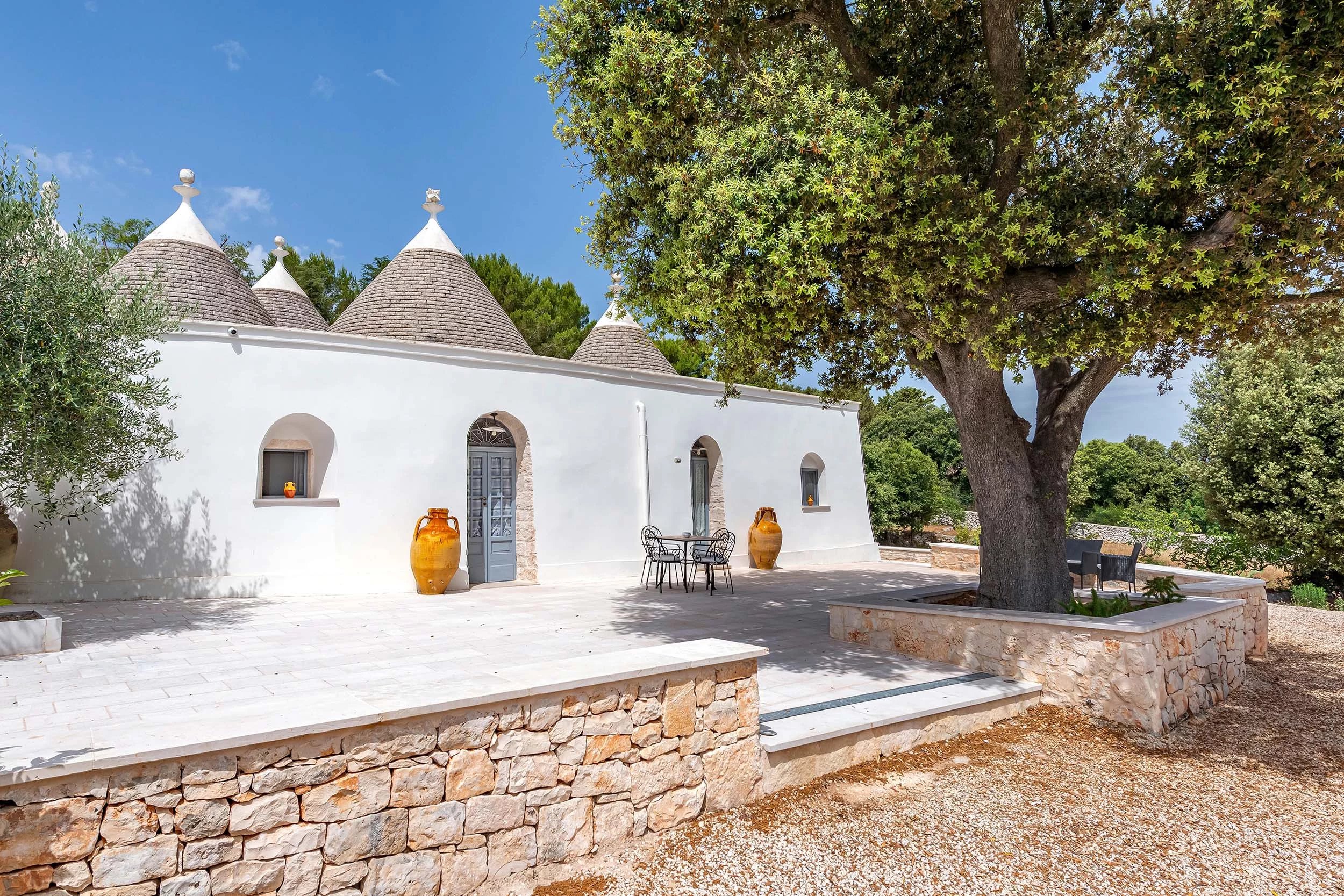 CHARACTER PROPERTY WITH TRULLI, SWIMMING POOL AND ADRIATIC SEA VIEWS IN THE PINE FOREST OF SELVA DI FASANO
