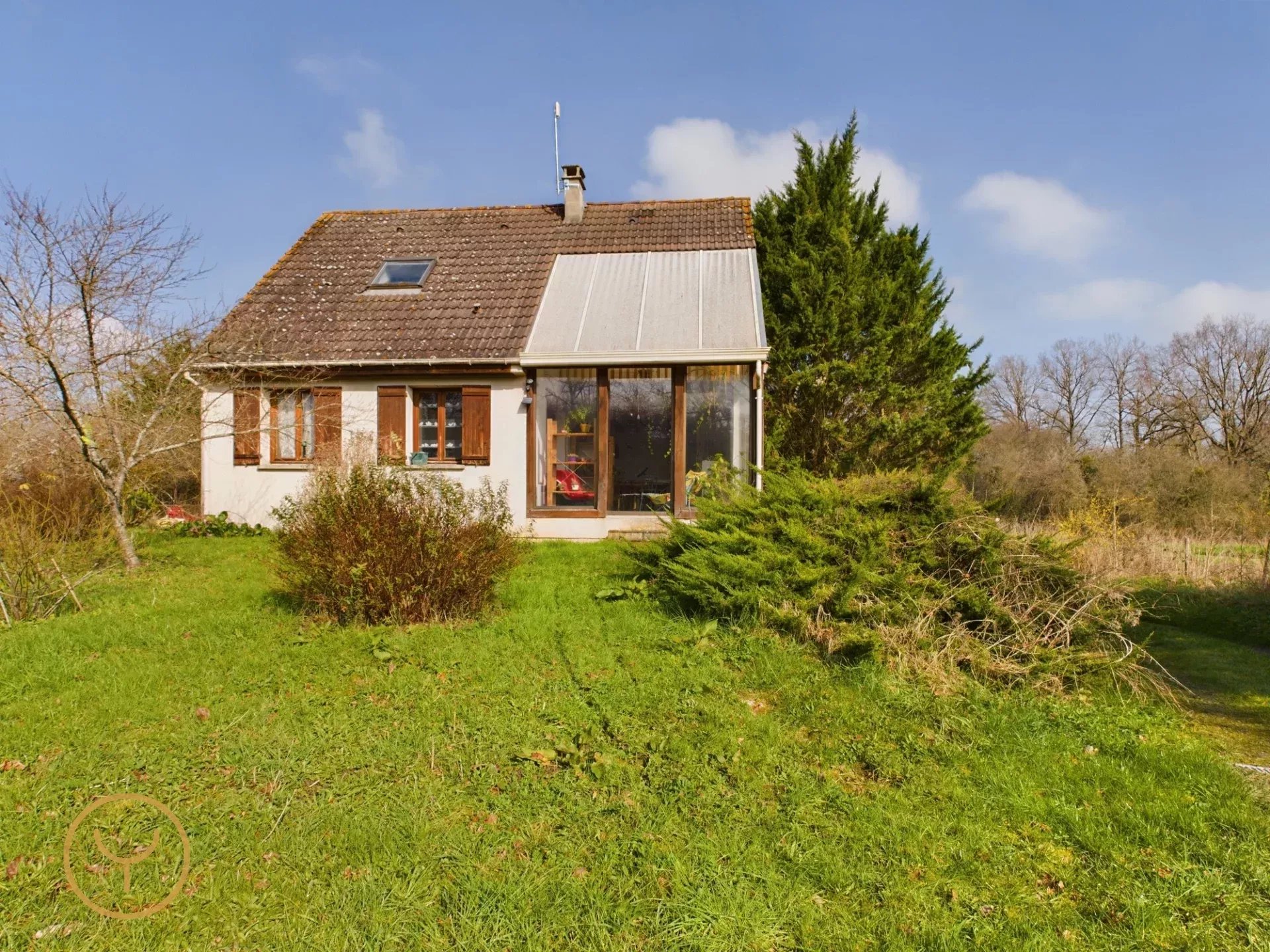 Maison familiale avec vaste terrain arboré