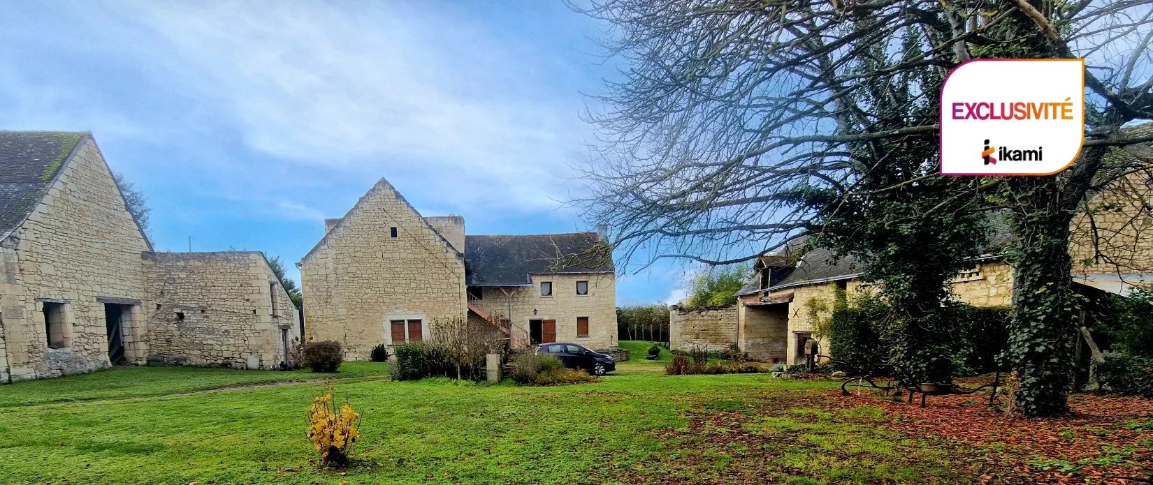 Propriété de caractère avec dépendances et 1 ha de terrain