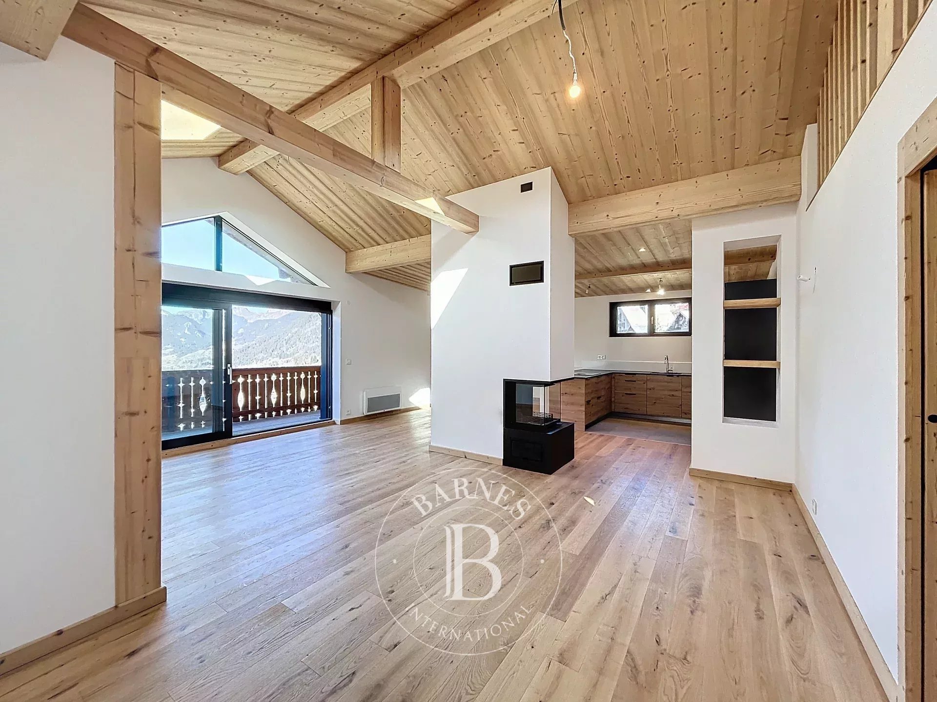 Châtel - T4 apartment (2023) of approximately 107,22 sq m of living space - 3 bedrooms - Village heart - Panoramic view - Fireplace - 2 covered parking spaces Accommodation in Les Gets