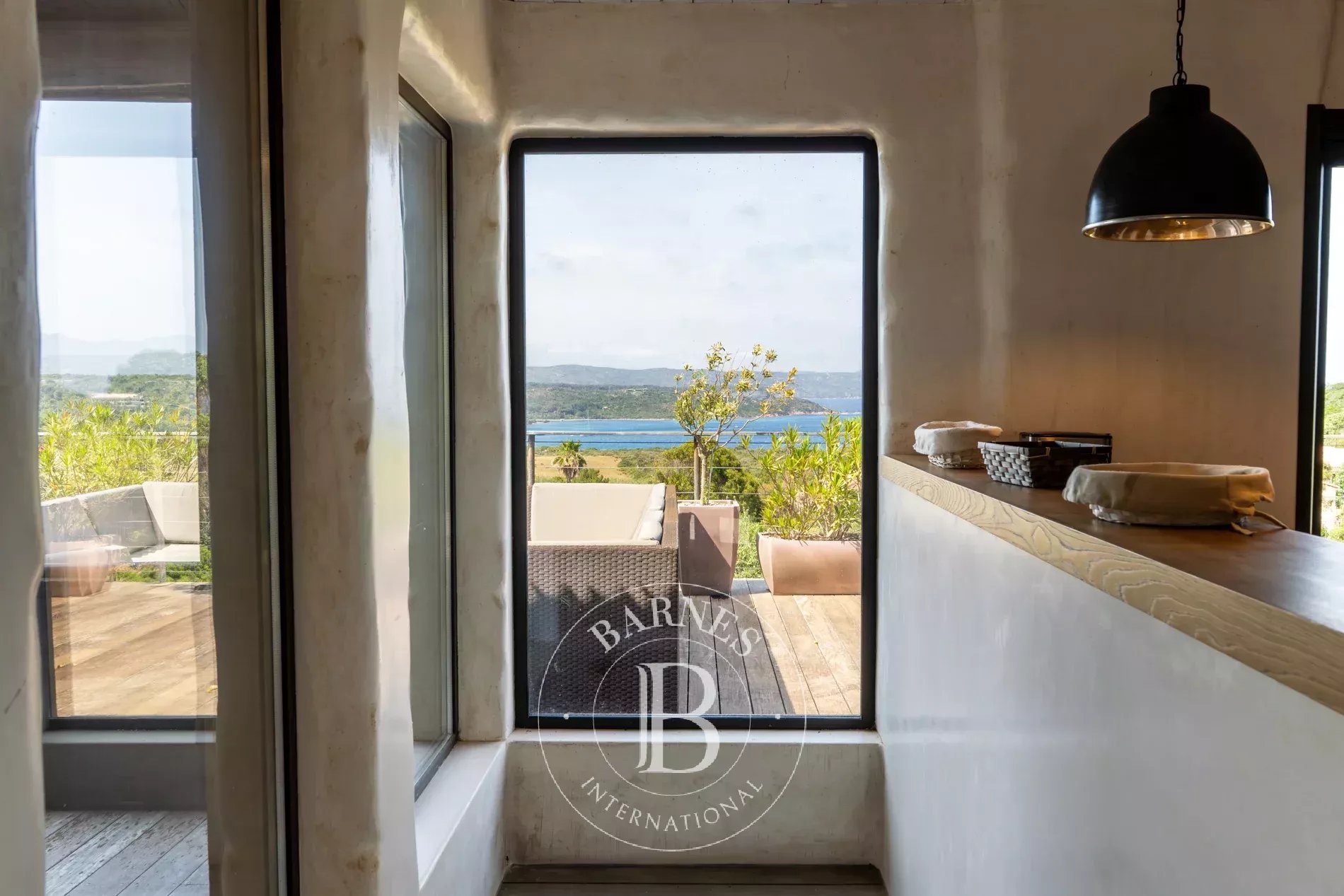 Exclusive listing – Bonifacio. Architect-designed villa in the style of a bergerie, featuring 4 bedrooms, a swimming pool, sea and mountain views, and close proximity to the beach. - picture 20 title=
