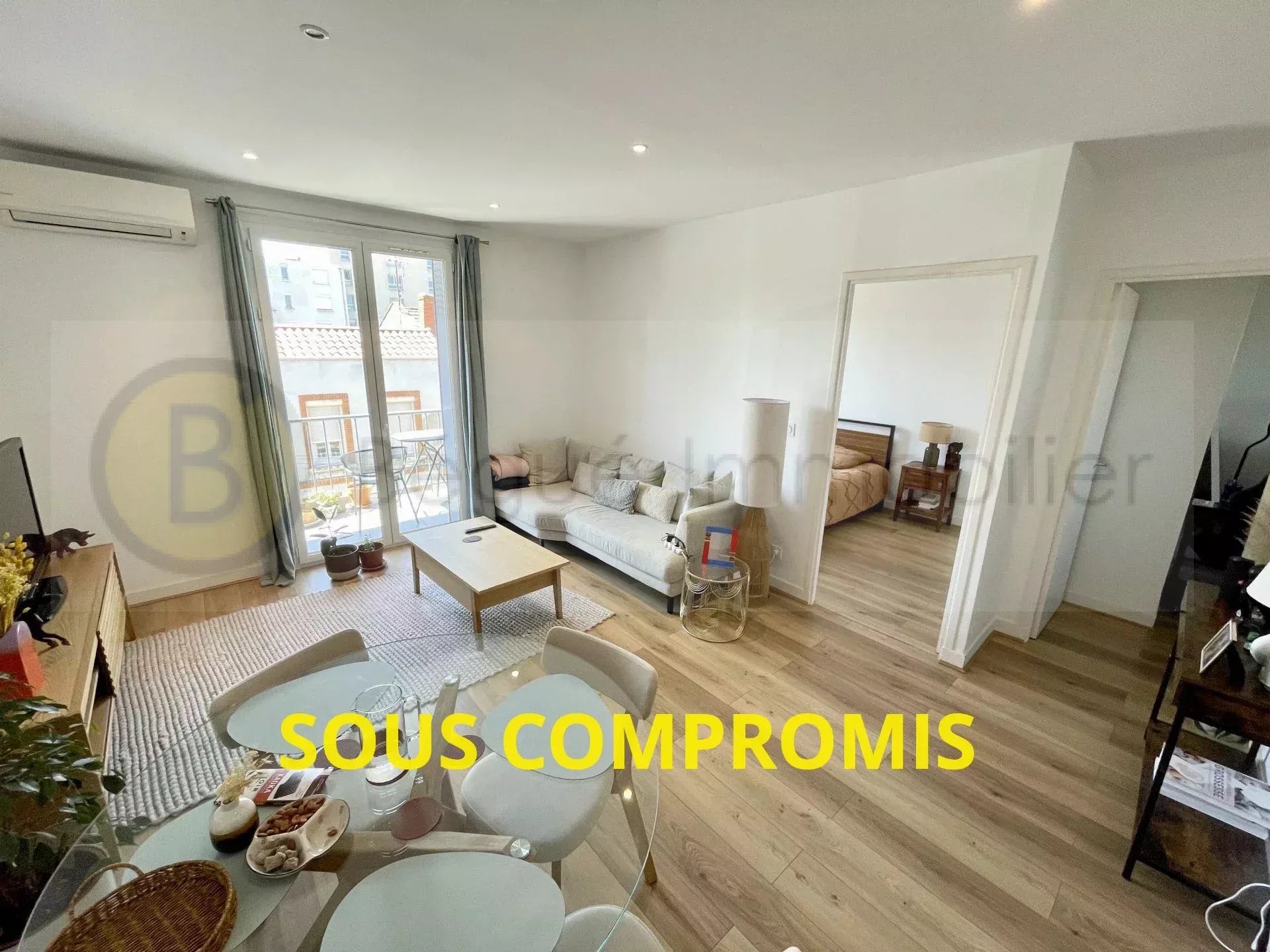 Appartement avec balcons et parking au calme