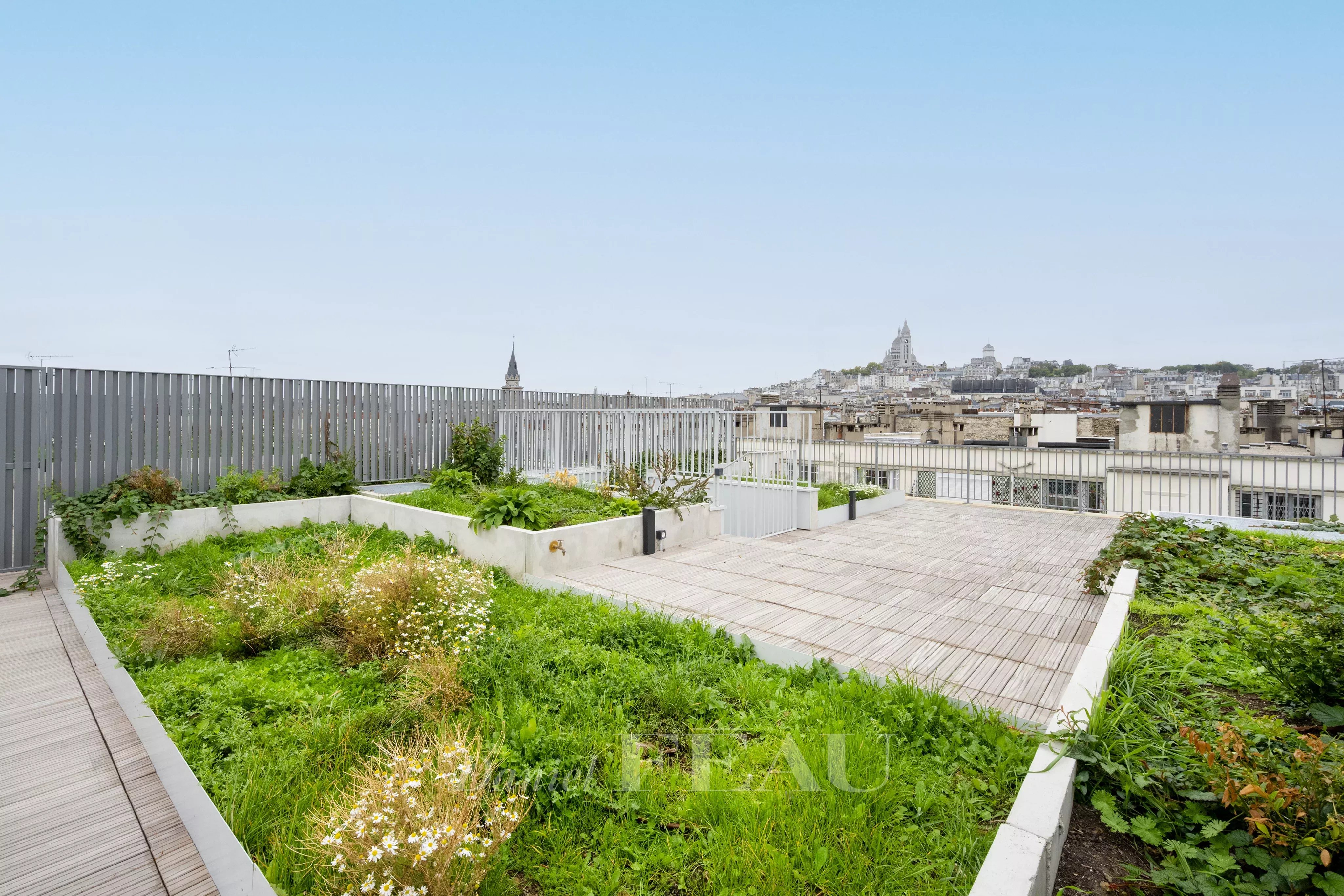 Paris 18th District –  An exceptional 4-bed apartment with a 100 sqm terrace