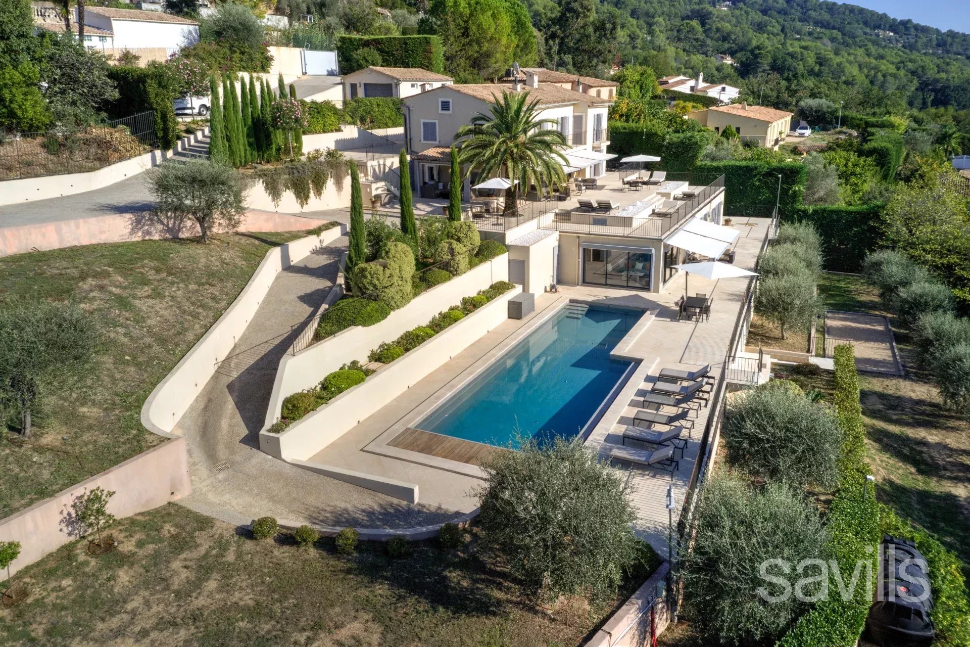 Luxury villa in a calm setting with panoramic views.