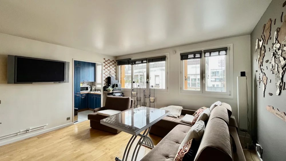 Agence immobilière de Un Appartement À Paris