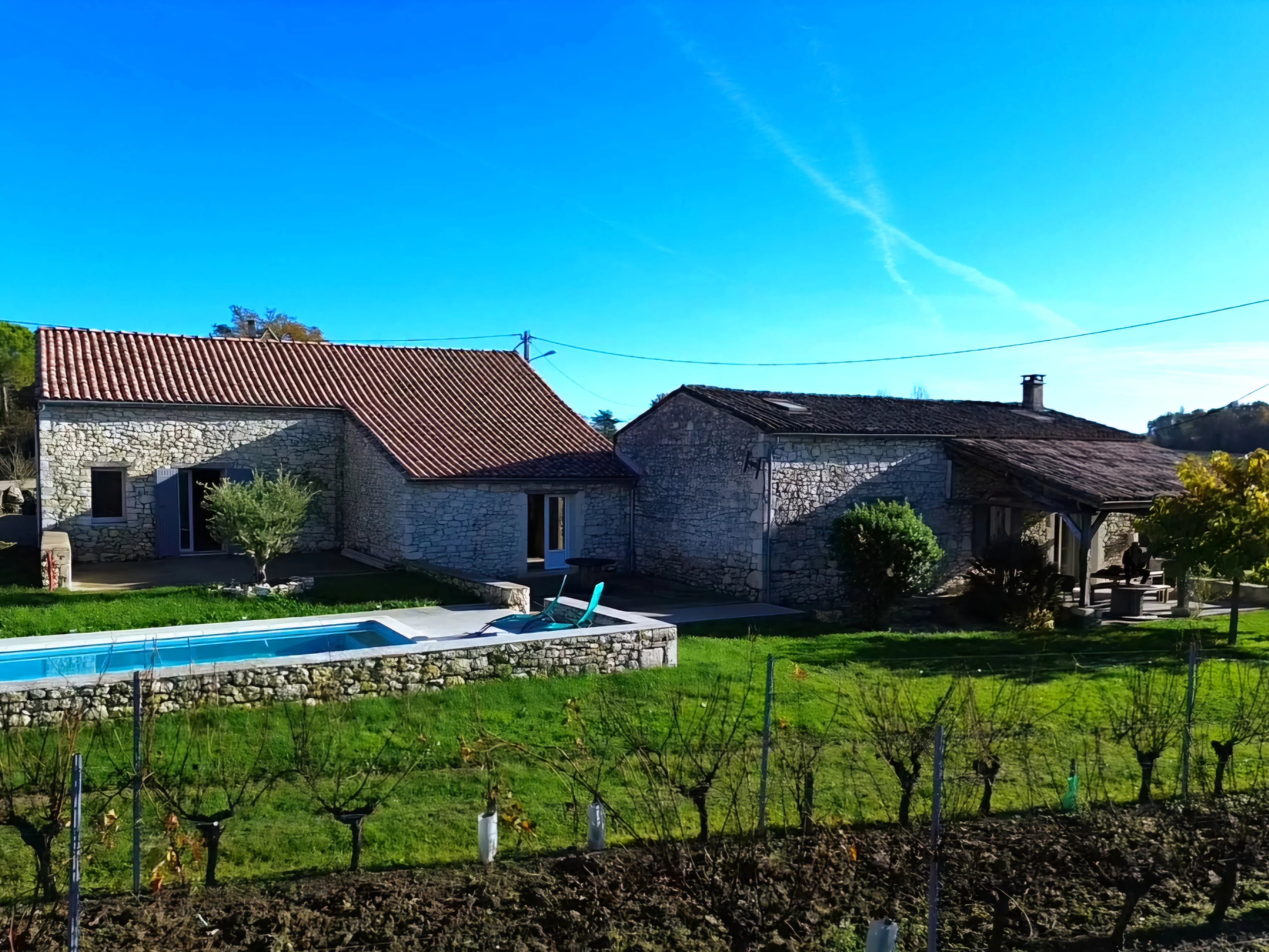 Pretty stone property set in vineyards with renovation opportunities