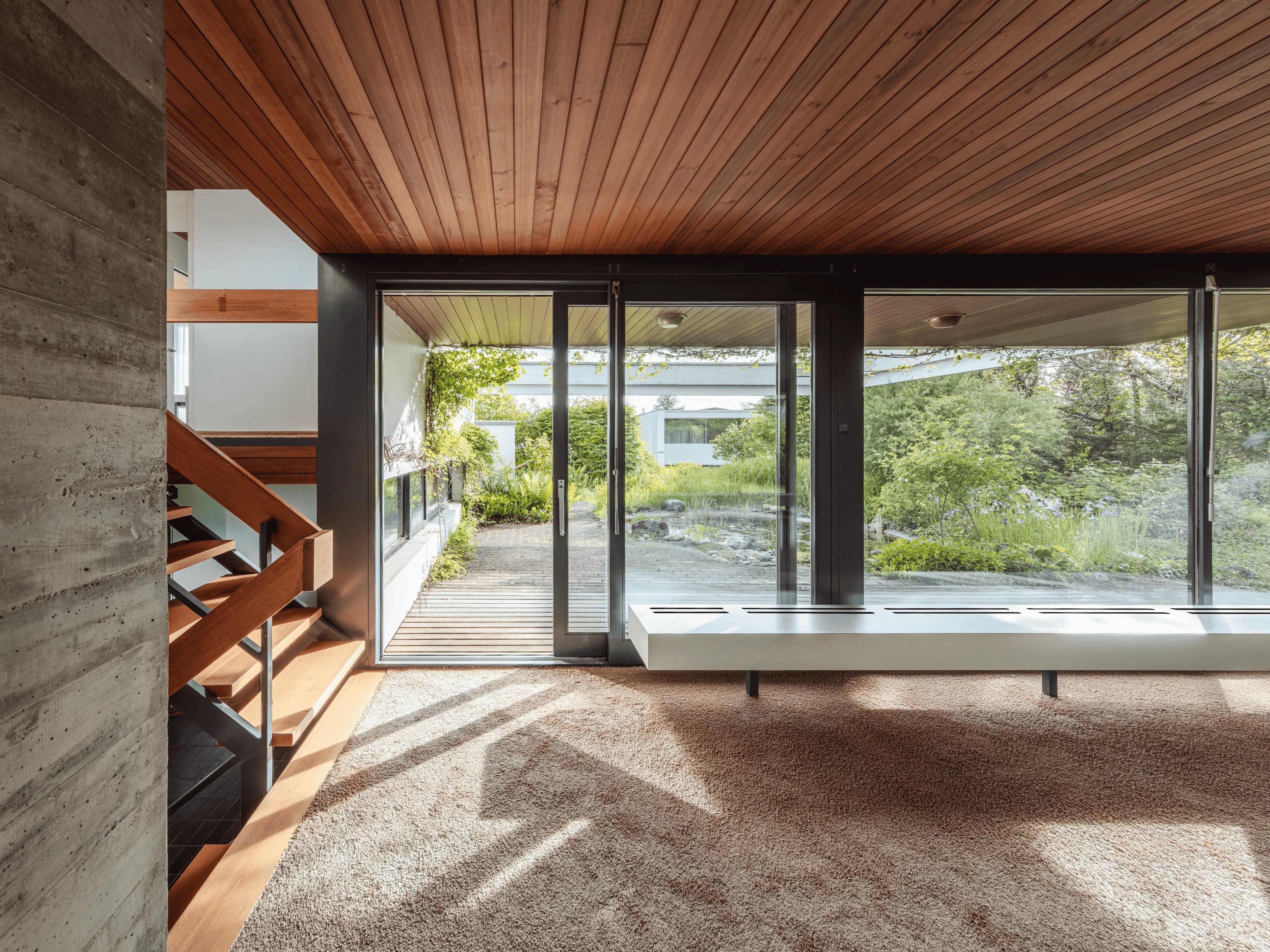 An architectural gem with a natural pond and development potential