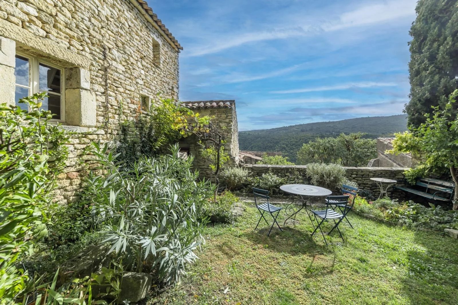 Exceptional village house with garden and view