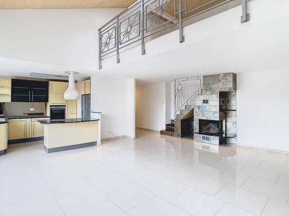 Duplex en attique avec terrasse au centre-ville